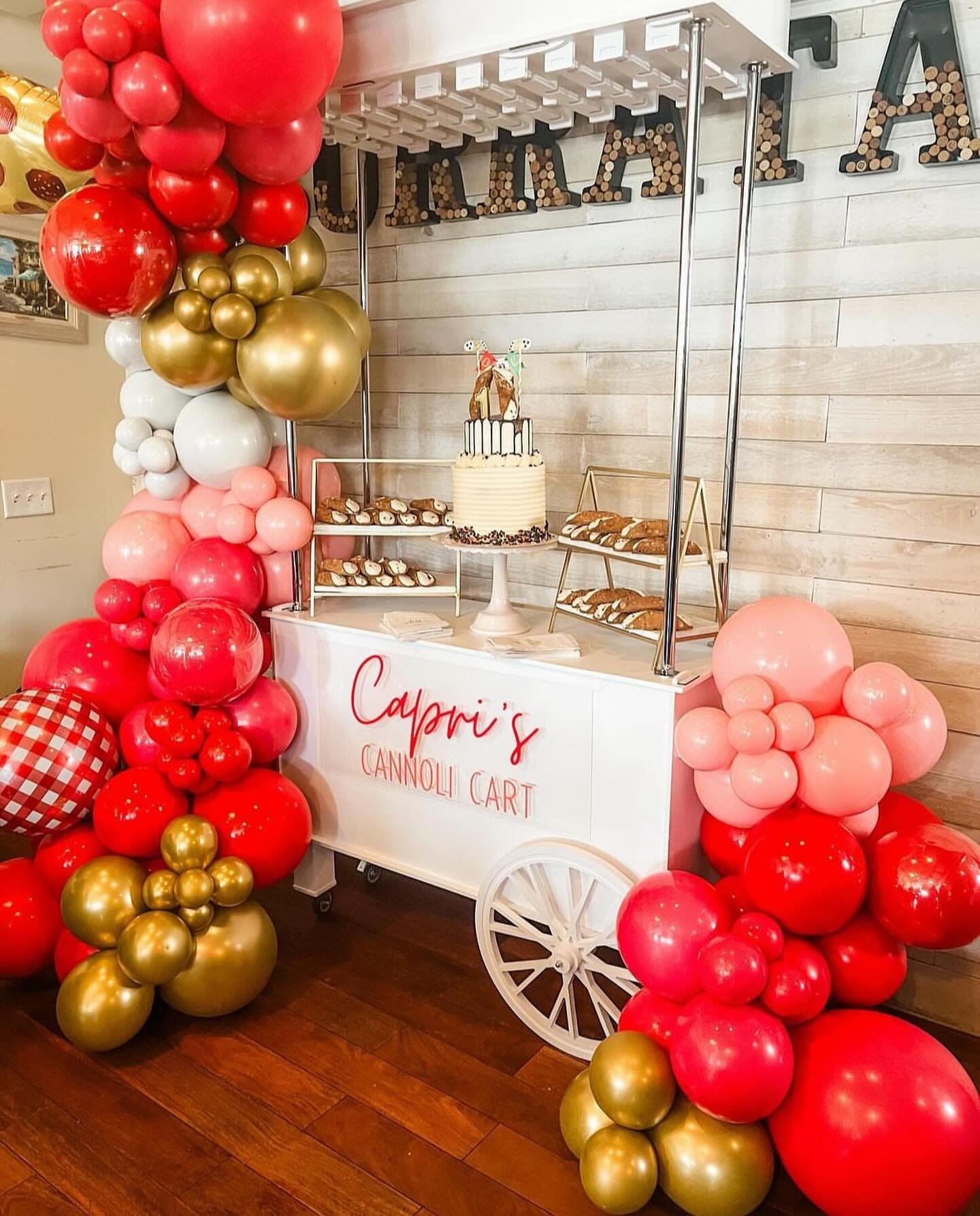 Capri&rsquo;s cannoli cart for her first bday!!!
how stinkin cute 

cake by @sweetwilhelminas 
balloons by @nuffinbuttaluv 
cart by @cartandsoulcelebrations 
signage by dis bitch
