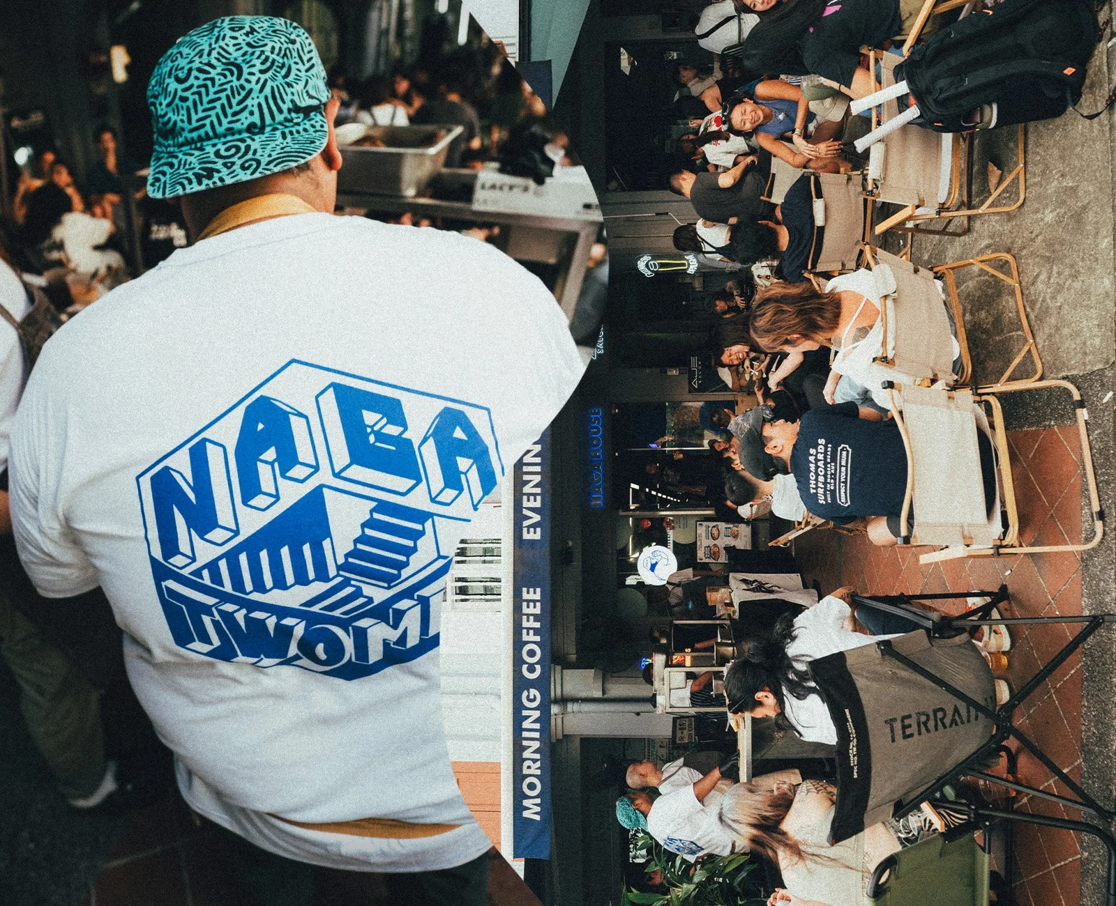 A man in a blue patterned cap and white hoodie with bold blue text that says 'NOLA WOLFA' on the back, standing outside a crowded cafe with people sitting and standing. There is a sign on the cafe that says 'Morning Coffee' and 'Event' and a woman si