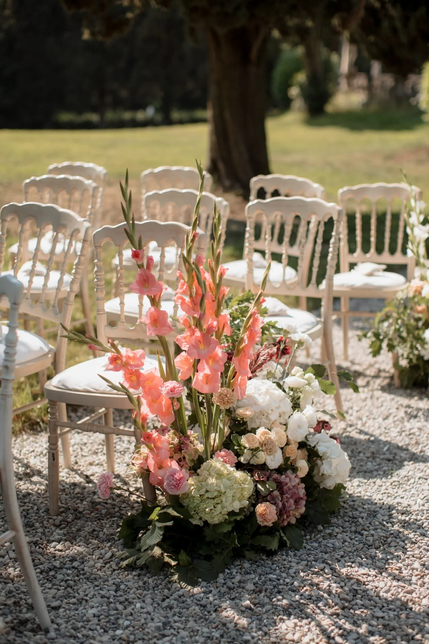 aisle-flowers-wedding-lake-como-wedding-light-colours.jpeg