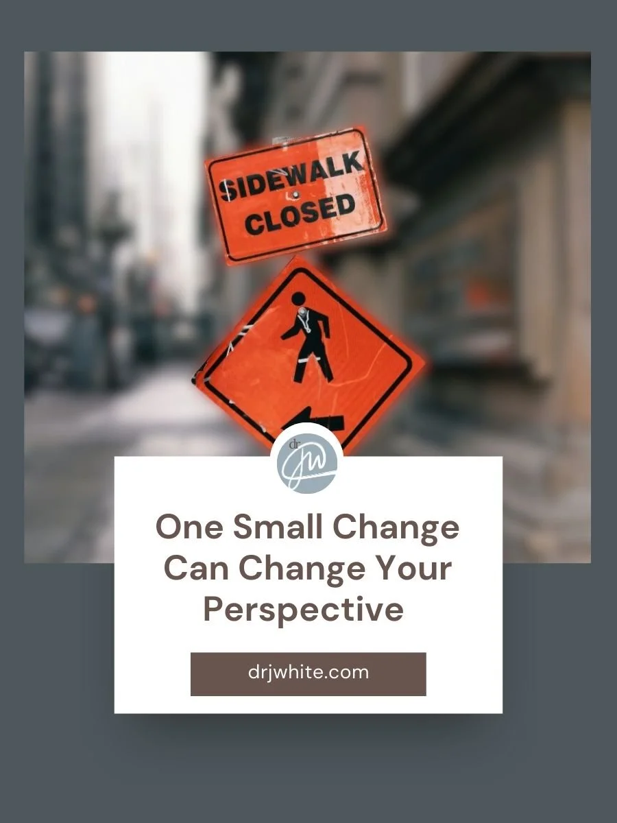 One Small Change Can Change Your Perspective Blog Post Cover with sidewalk closed small detour sign to encourage you to take a different route for a new experience