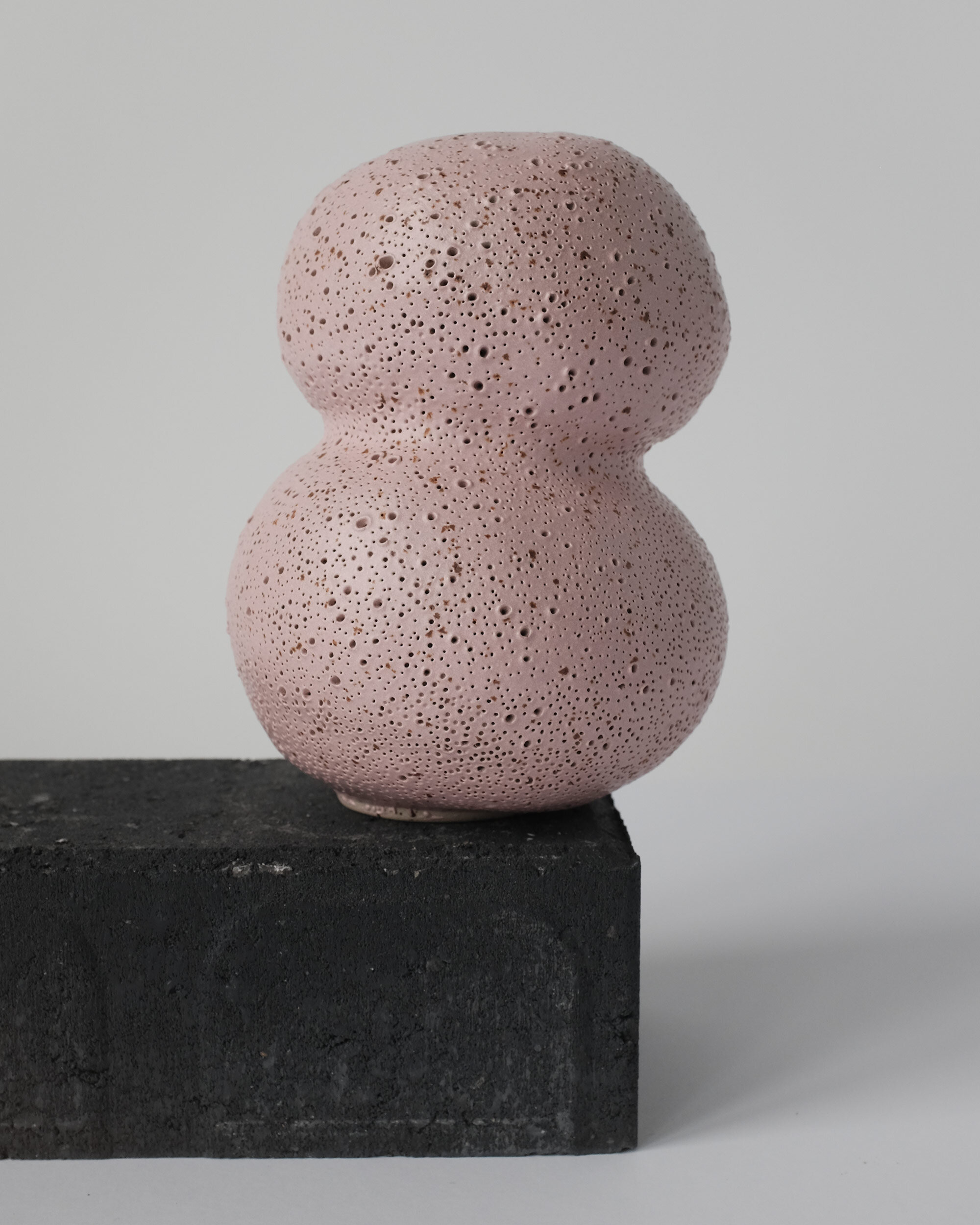 SMALL VASE
with pink sgraffito decoration. approximate measures 11cm diameter and 16cm tall.