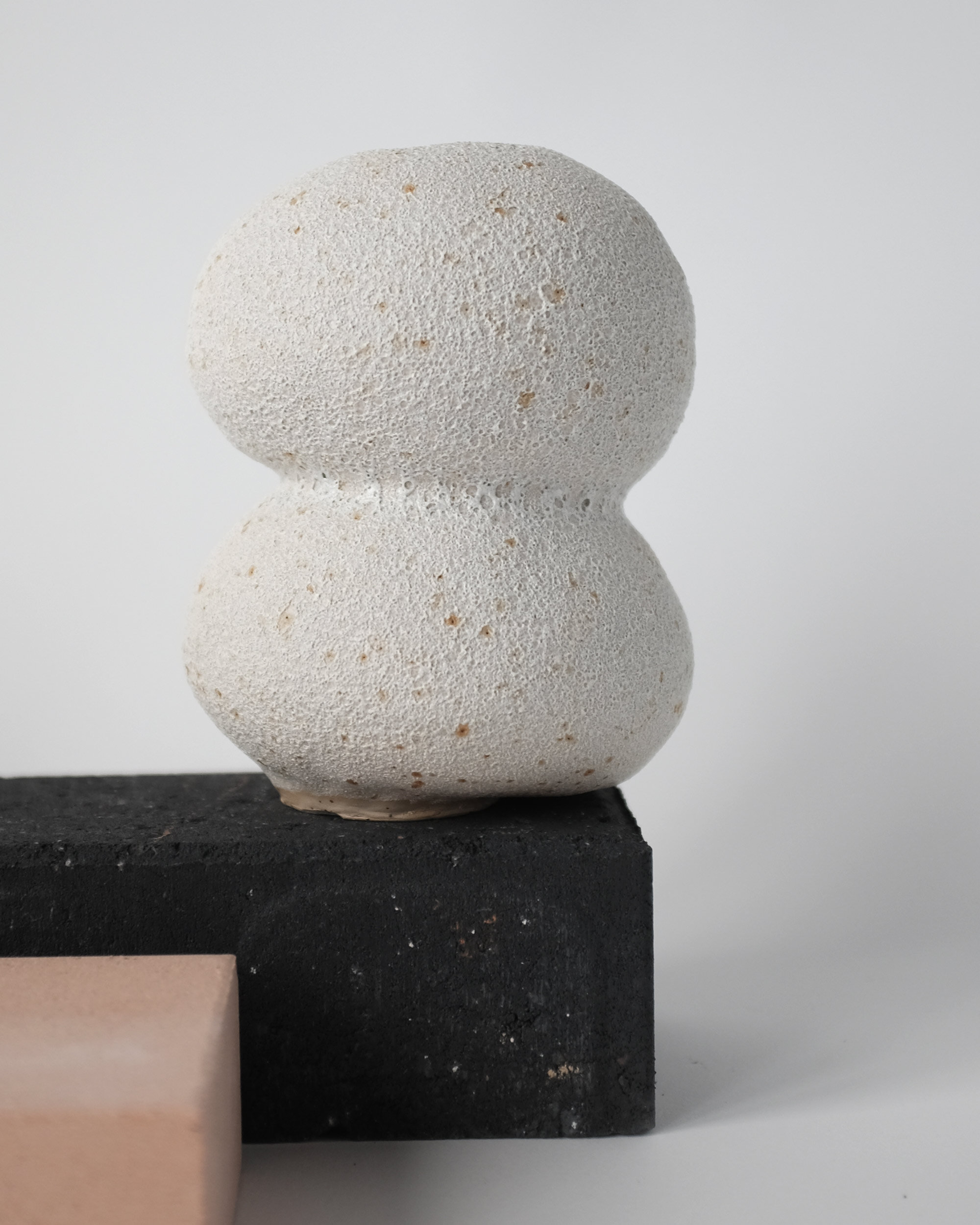 SMALL VASE
vase with white crater glaze. approximate measures 11cm diameter and 15cm tall.