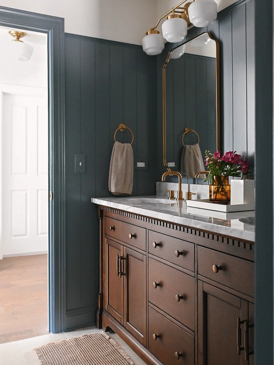 Our boys&rsquo; bathroom remodel is complete!! I partnered with @signaturehw to refresh this bathroom for my two boys, and I&rsquo;m so excited to reveal it here!

Swipe to see what the bathroom looked like before this project &mdash;&gt;

I really l