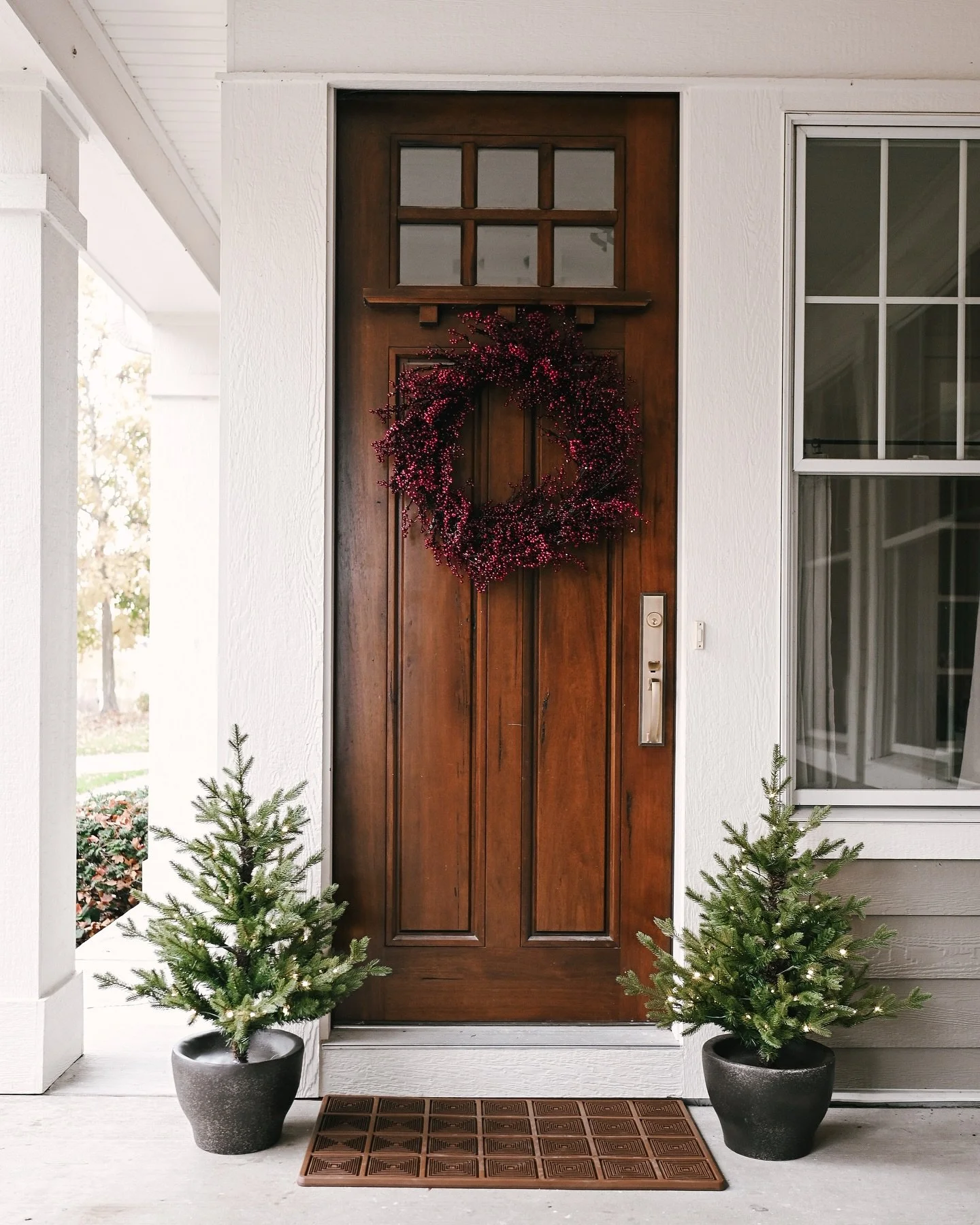 Peep the updated front door set // the Aurick from @signaturehw ✨ We&rsquo;re keeping it simple this year with our Christmas d&eacute;cor. Something about having a one-year-old boy on the loose has me anxious about putting too many new and exciting t
