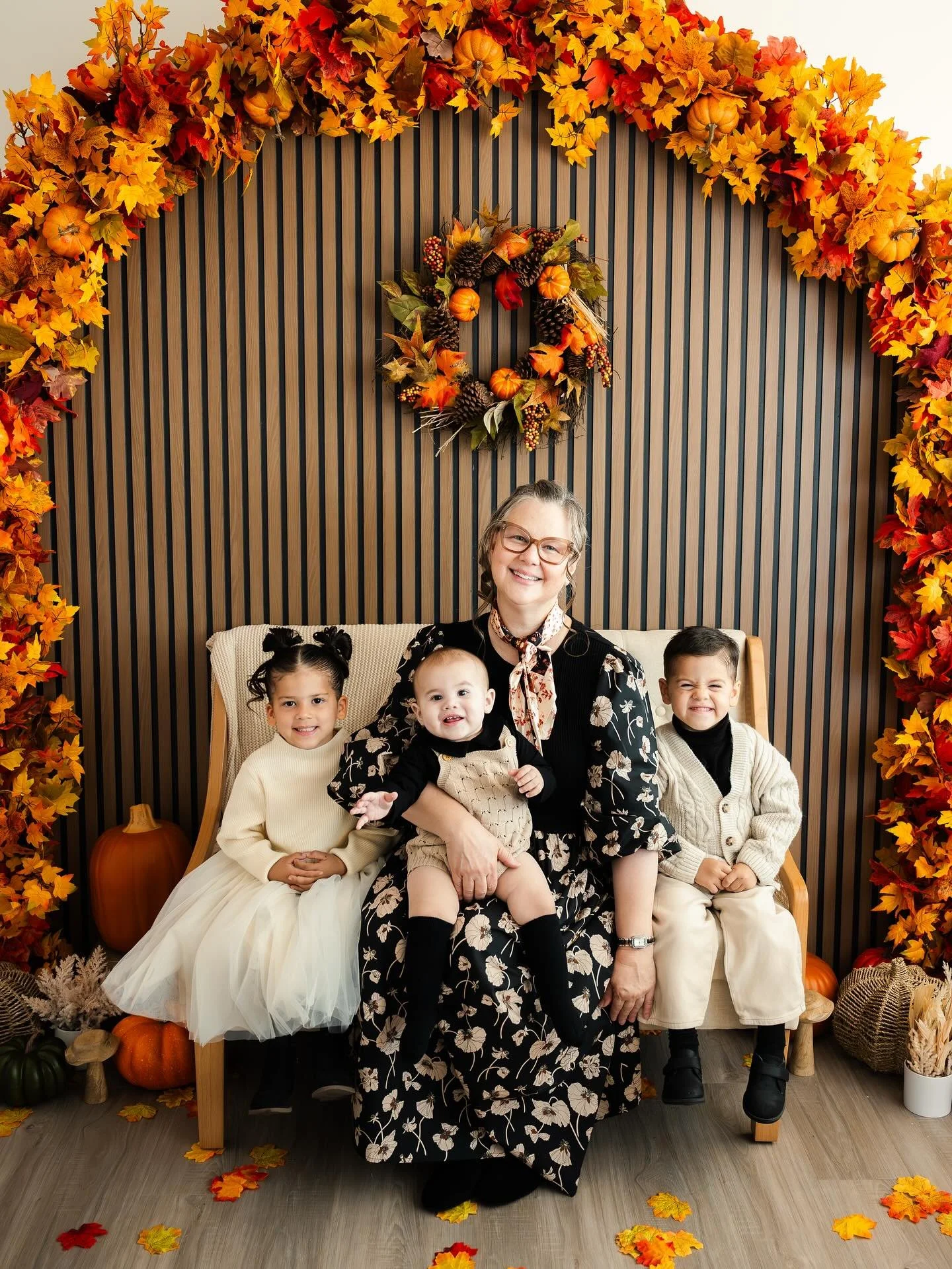 🍁 Grateful Hearts &amp; Cozy Moments 🍂

Nothing says fall like cuddles, giggles, and a whole lot of love between a grandmother and her grand-babies. 

What a wonderful idea to get pictures taken with your grandkids. These are moments that deserve t
