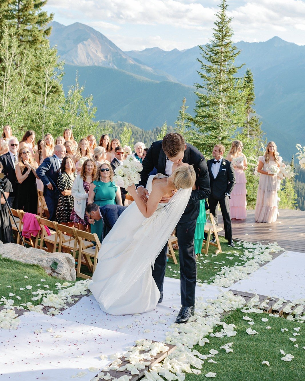Behind every perfect shot is perfect imperfection. ✨

Pictured: Natural Folding Chairs, Stunning Mountain Views, Adorable Newlyweds, Supportive Family + Friends

📸 - @sarahporterphotos 
📋 - @bybelloevents
📍 - @thelittlenell / sundeck on top of Asp