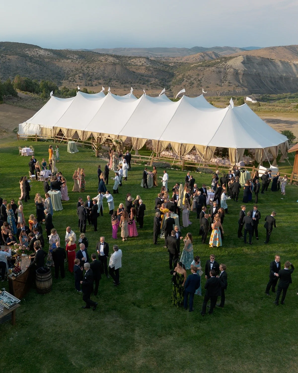 A sailcloth tent glowing in the sunlight sets the tone for what&rsquo;s to come &mdash; relaxed, refined, and ready to celebrate. Thoughtfully designed spaces give guests a moment to gather, sip, and take it all in before the big &ldquo;I do.&rdquo;
