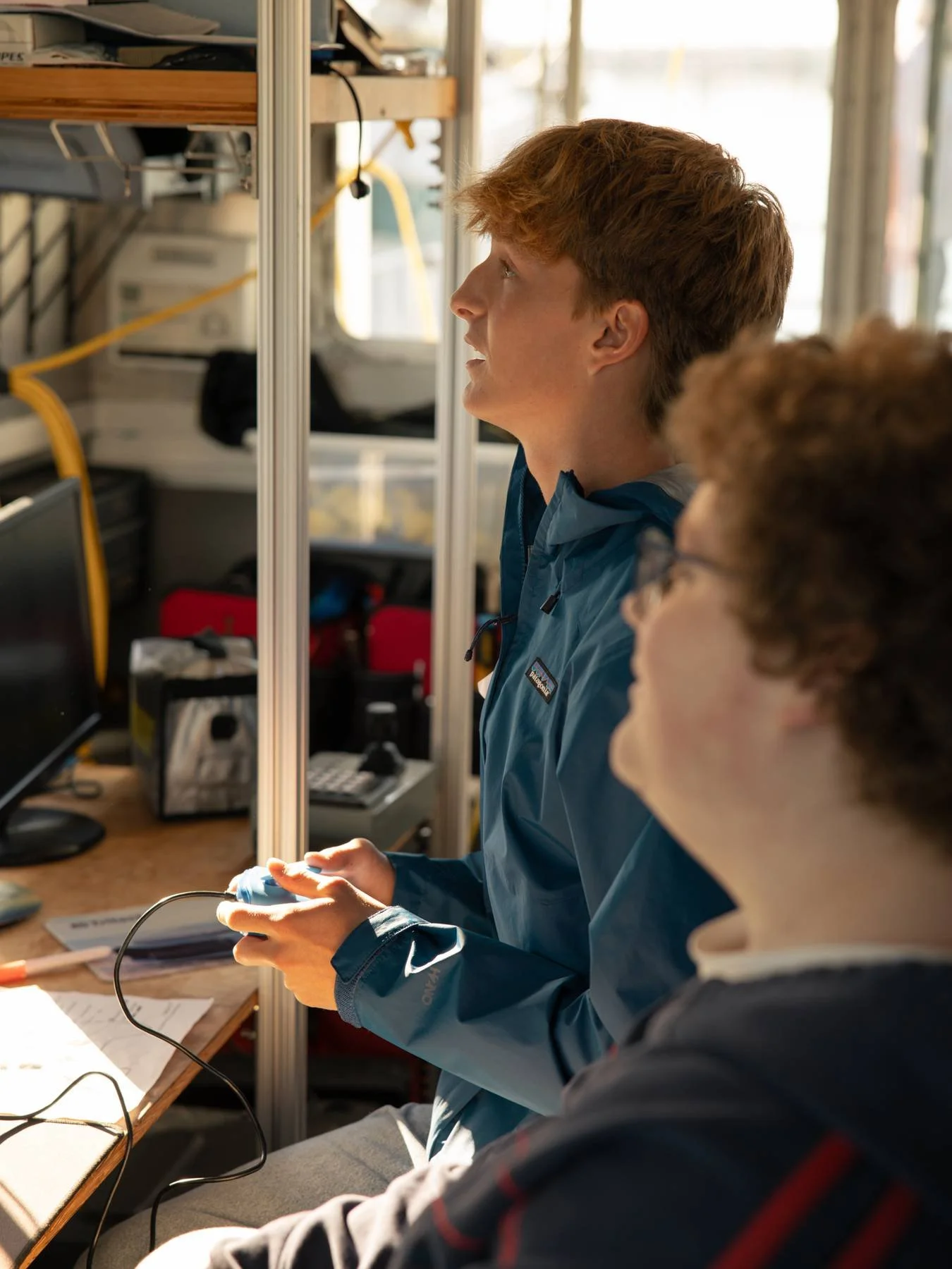 Student uses a controller to steer an ROV