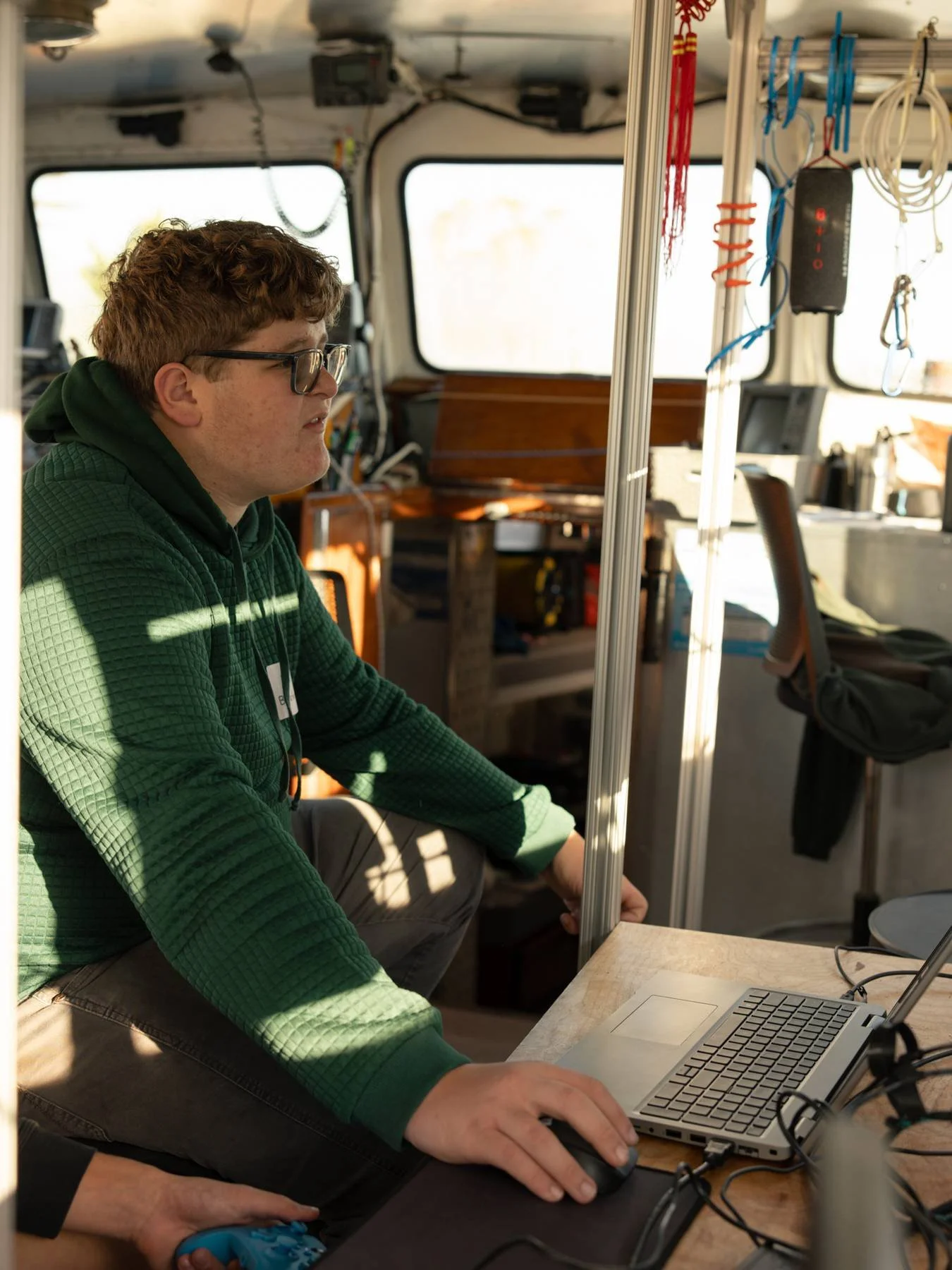 Student looks at sonar image from ROV