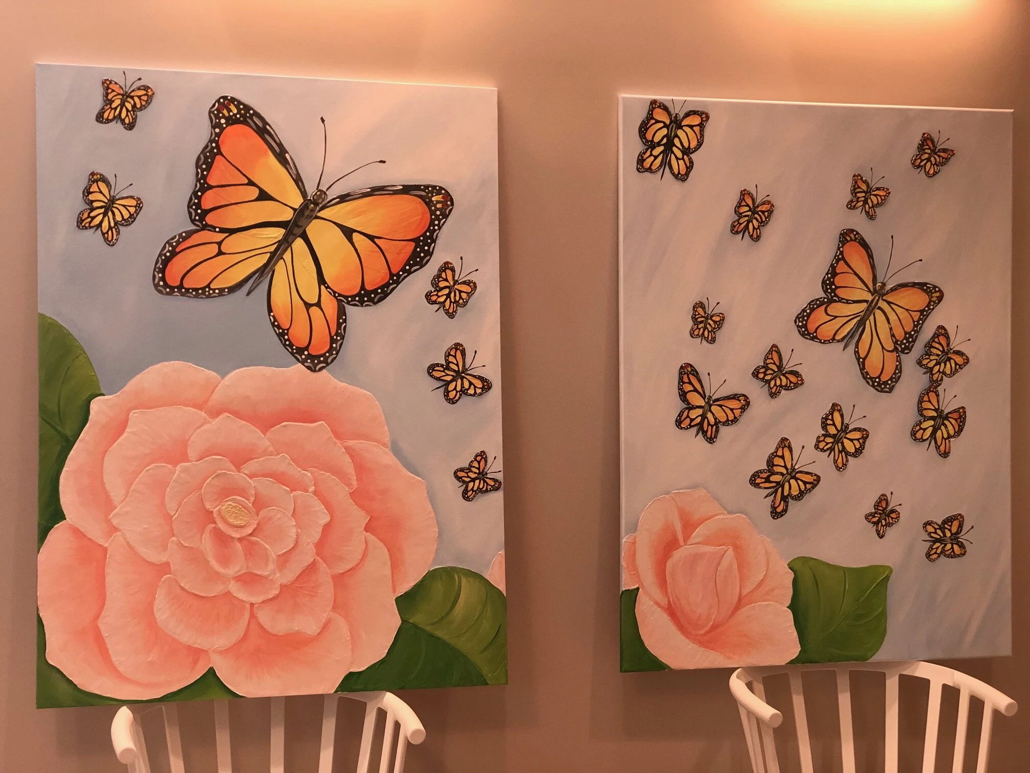 I sculpted the images on the canvases first then painted. This was before they were hung.