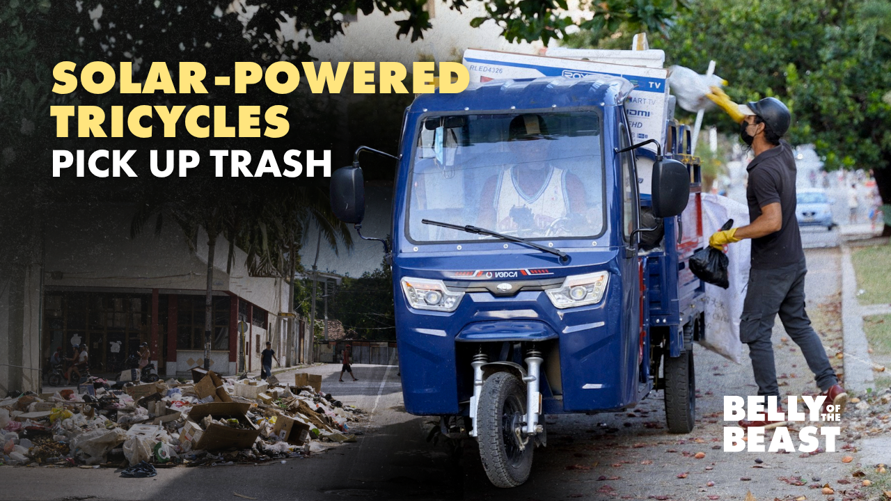 A worker loads trash into a blue solar-powered tricycle used for garbage collection in Havana, Cuba. Text reads: “Solar-Powered Tricycles Pick Up Trash.”