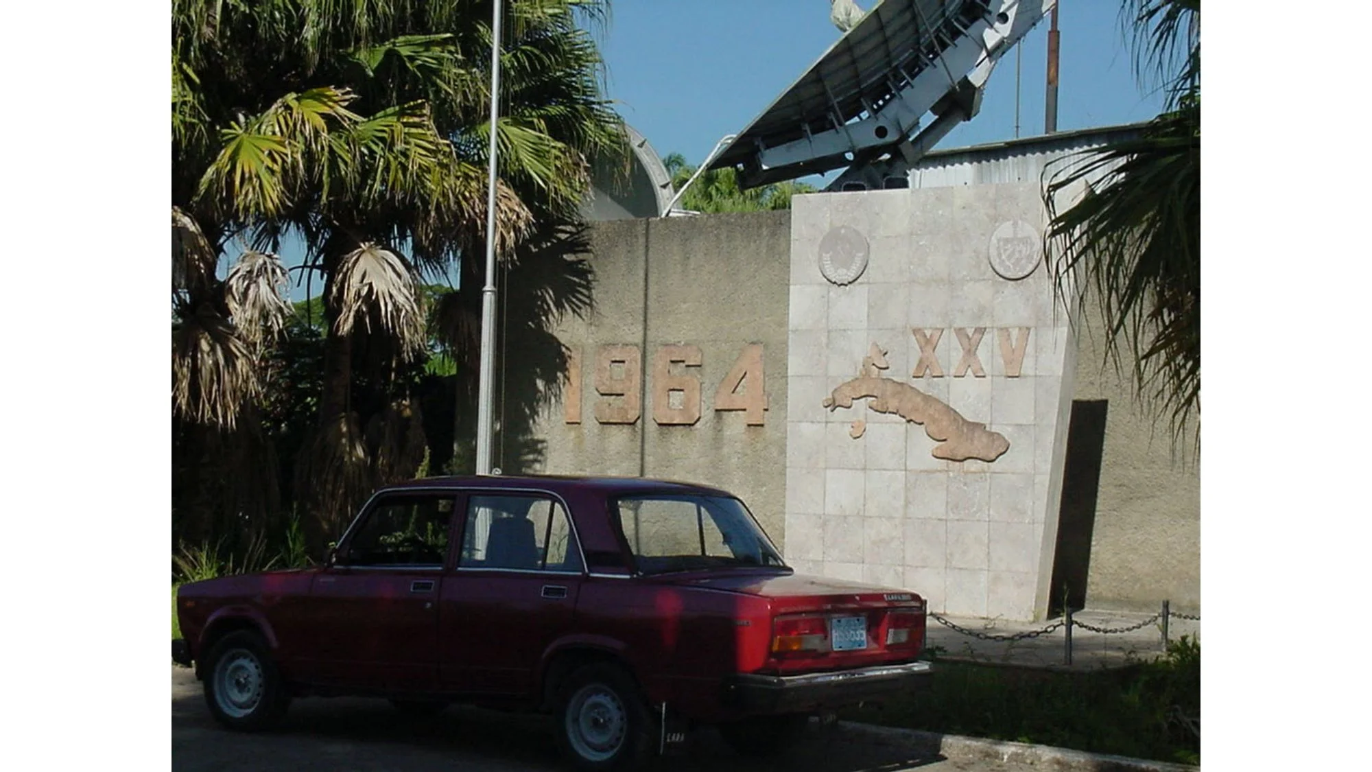 A photo of the wall of the Russian base known as Lourdes with satellite dishes in the background, before the base was dismantled. PHOTO CREDIT: Rafael Torralbas