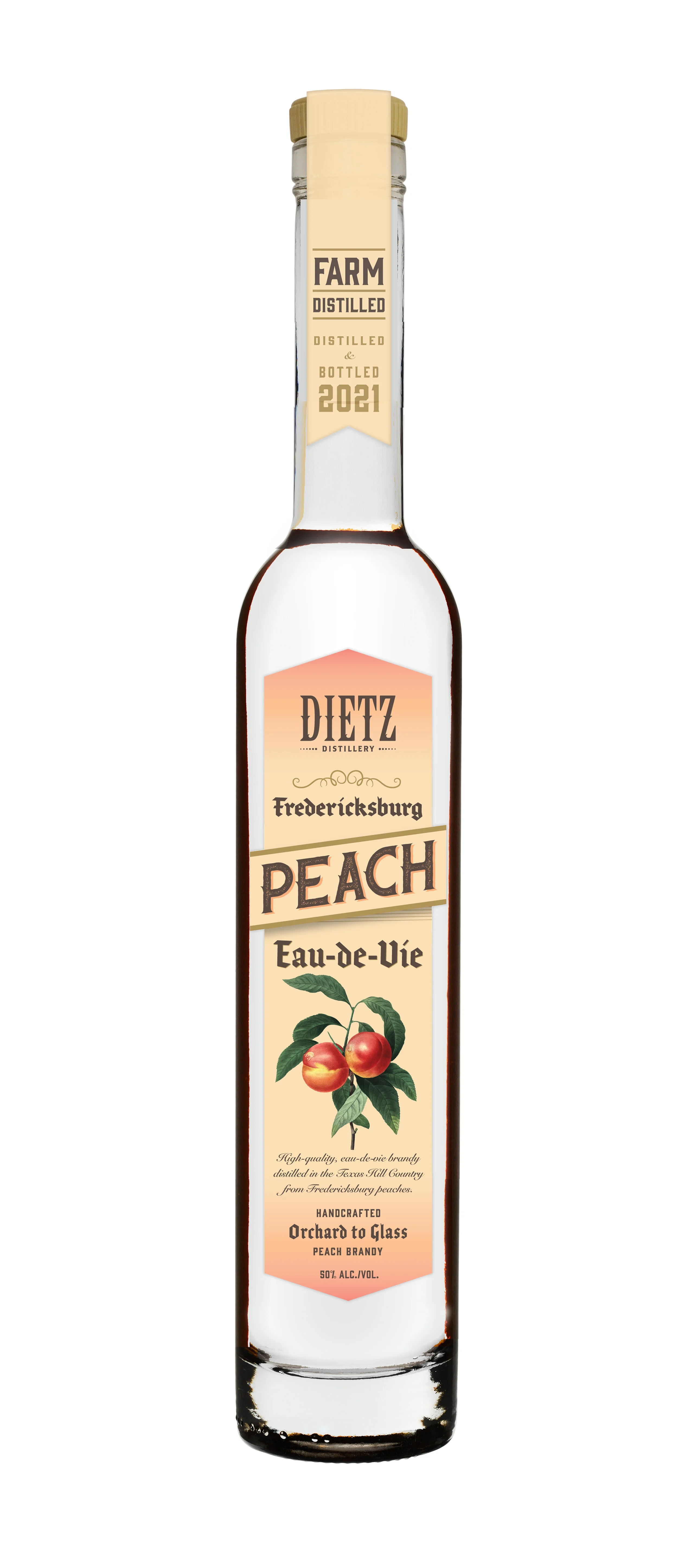 A clear glass bottle of Dietz Fredericksburg Peach Eau-de-Vie with a label featuring a peach illustration and text indicating it is handcrafted peach brandy bottled in 2021, with 50% alcohol content.