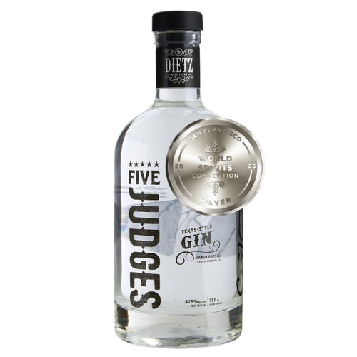 A clear bottle of DIETZ gin with a black cap, featuring a silver medal award and labels indicating it's a Texas-style gin, handcrafted, 750ml, 47.5% alcohol, and a San Francisco world spirits silver medal.