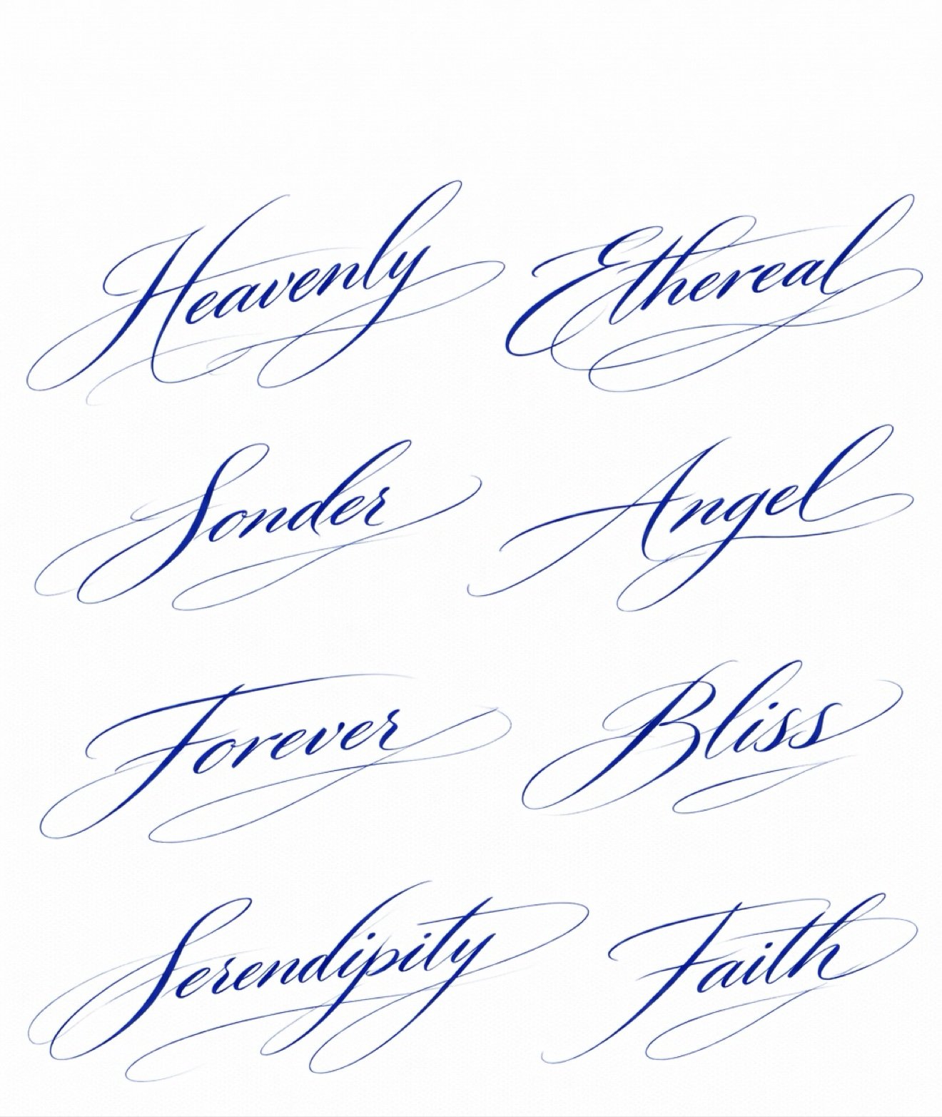 Script word flash tattoo designs in blue calligraphy at Studio Vanassa in Edmonton