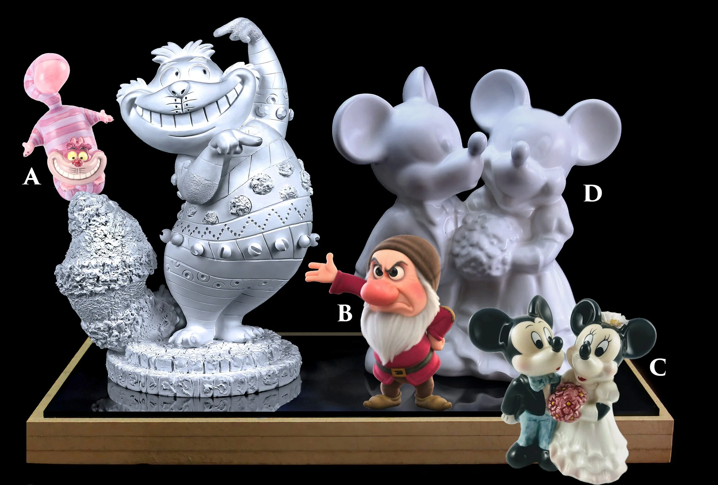 CHESHIRE CAT Regaling His Nano-Detail
A  B  &  C - Plaster Molded And Glazed Casts  
D - Plaster Molded Pre-Glazed Cast
