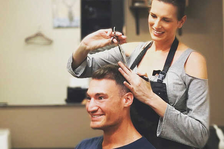 "Nichole provides the best haircut for men hands down." Adam