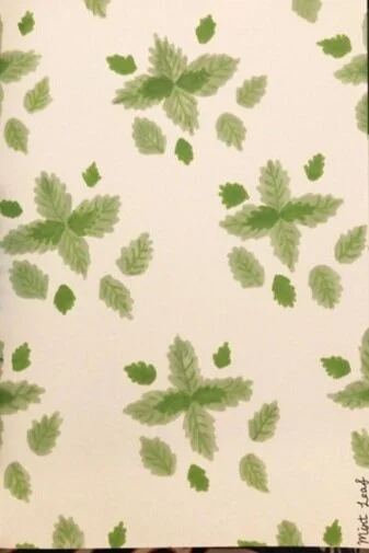 Pattern of green leaves on a white background.