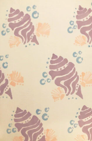 Repeating pattern of purple seahorses, orange shells, and blue bubbles on a light background.