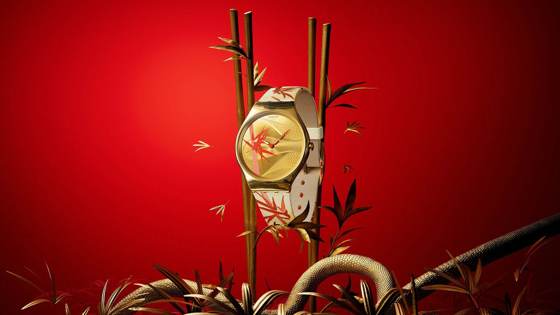 A wristwatch with a gold case and a white strap featuring red and gold leaf designs, displayed against a red background with gold and black bamboo stalks and leaves, and a gold snake at the bottom.