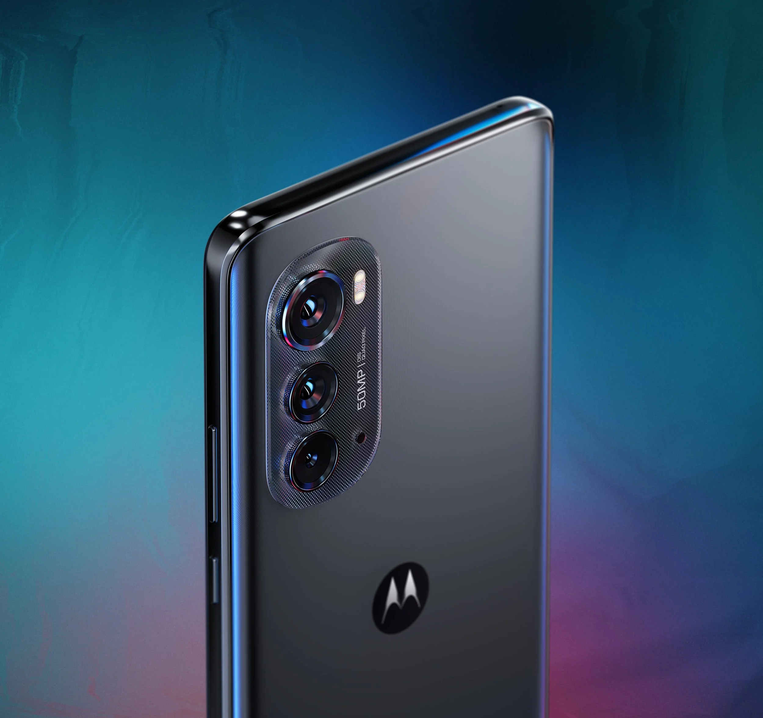 Close-up of a modern Motorola smartphone with a triple-lens camera on a gradient background.