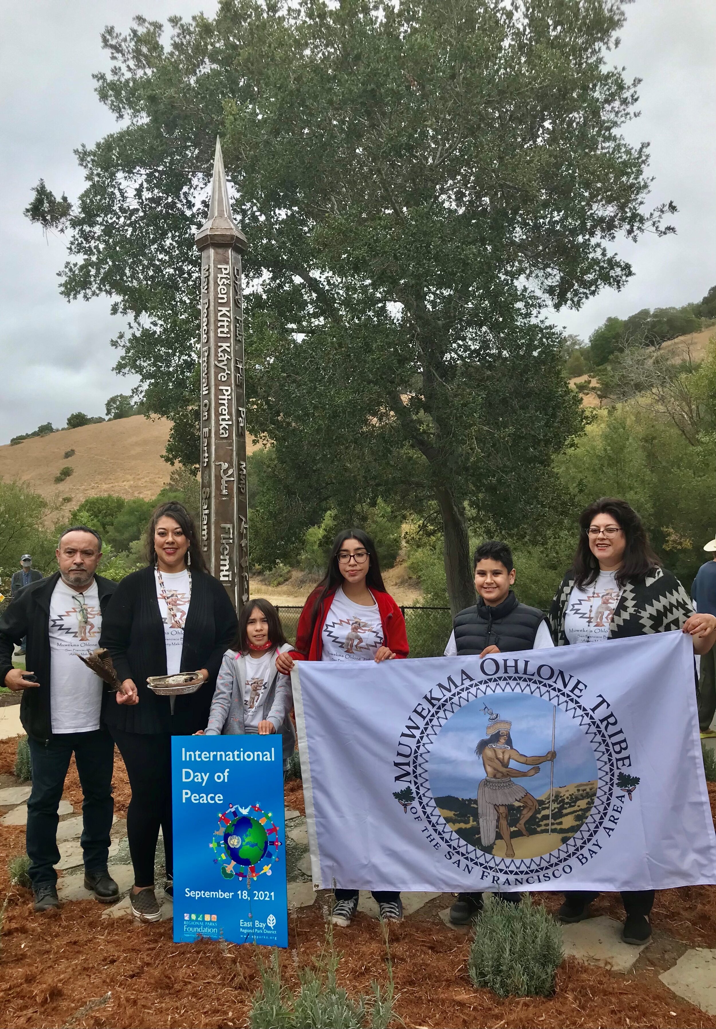  Members of the&nbsp;Muwekma Ohlone Tribe perform blessings on the newly installed Peace Pole at Lake Chabot 