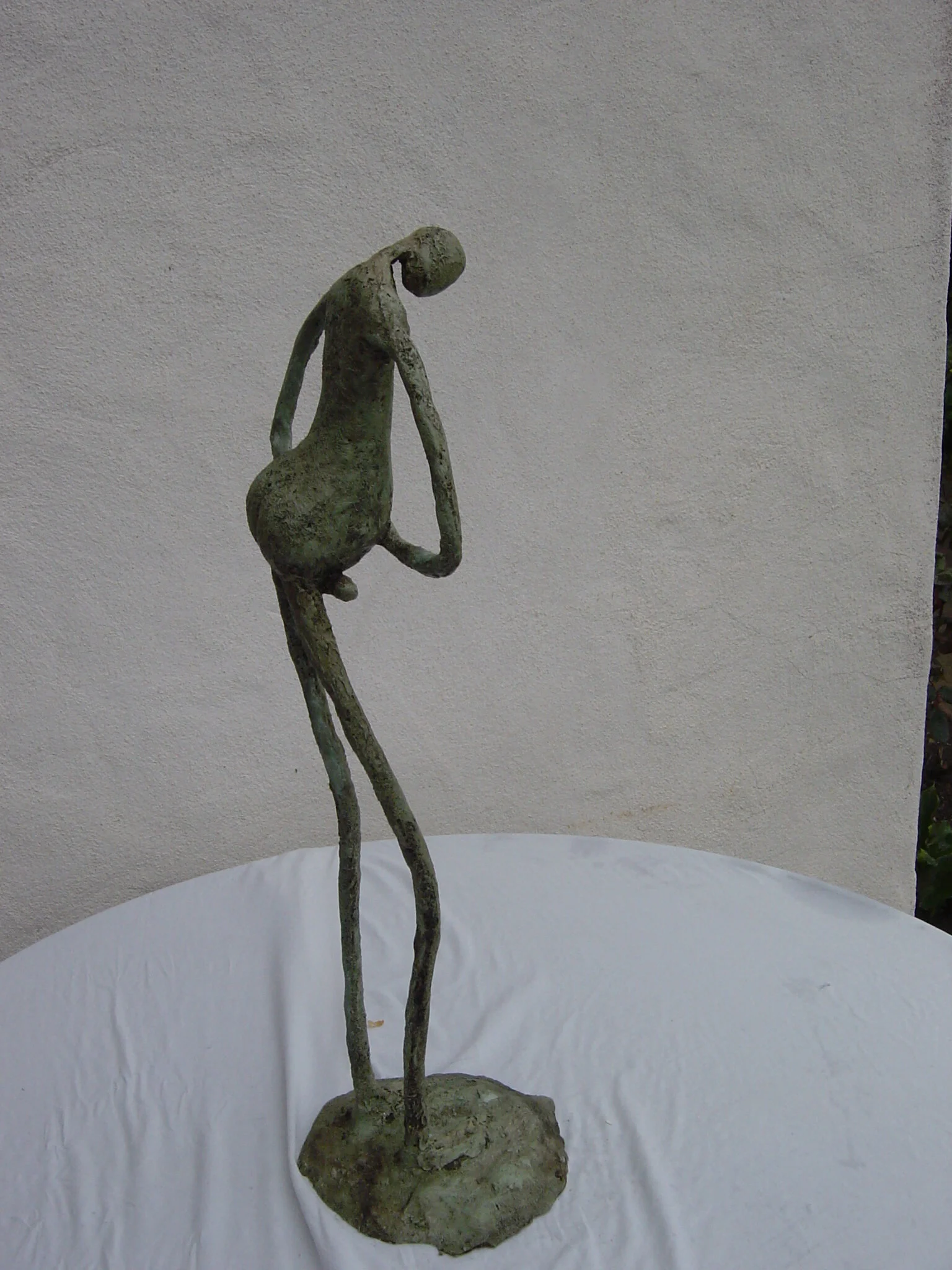 Figure from L'attente - stucco