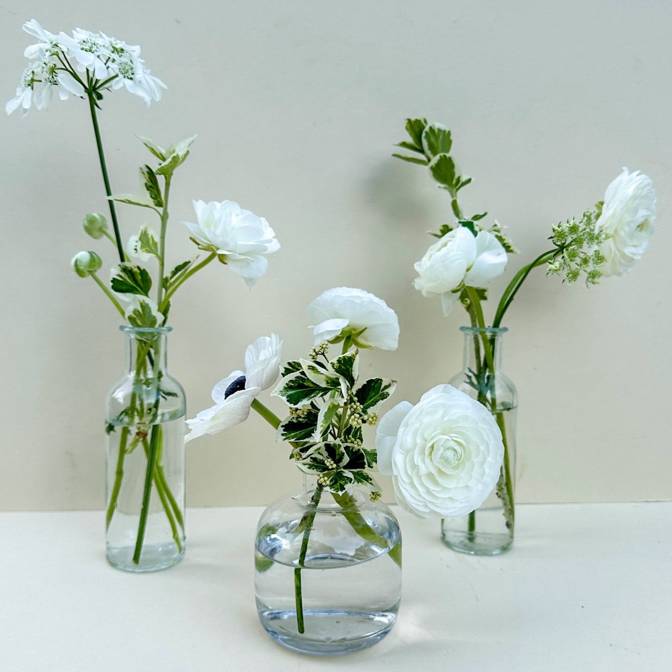 white-flowers-in-bud-vases.jpg