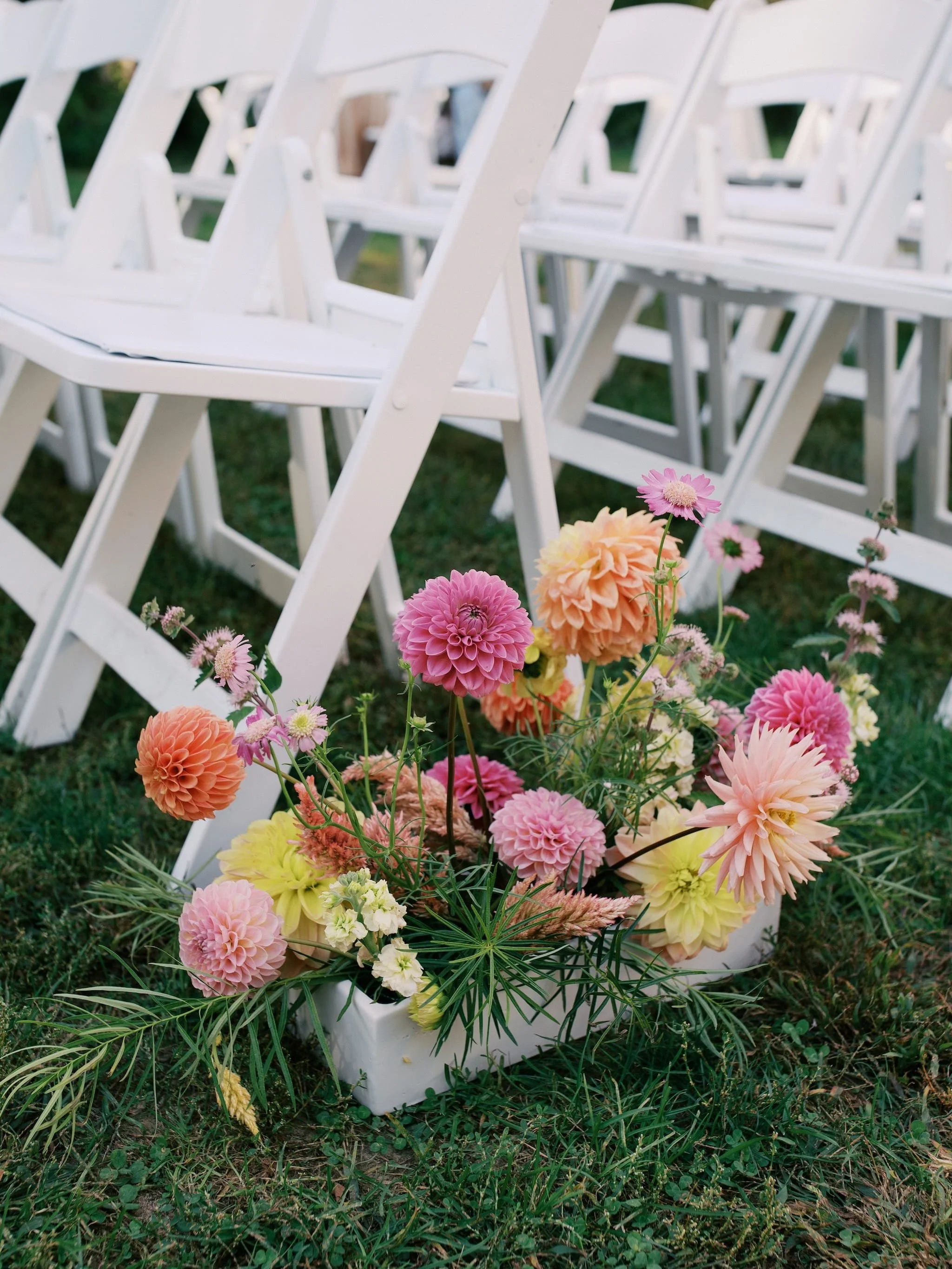 bright wedding aisle flowers