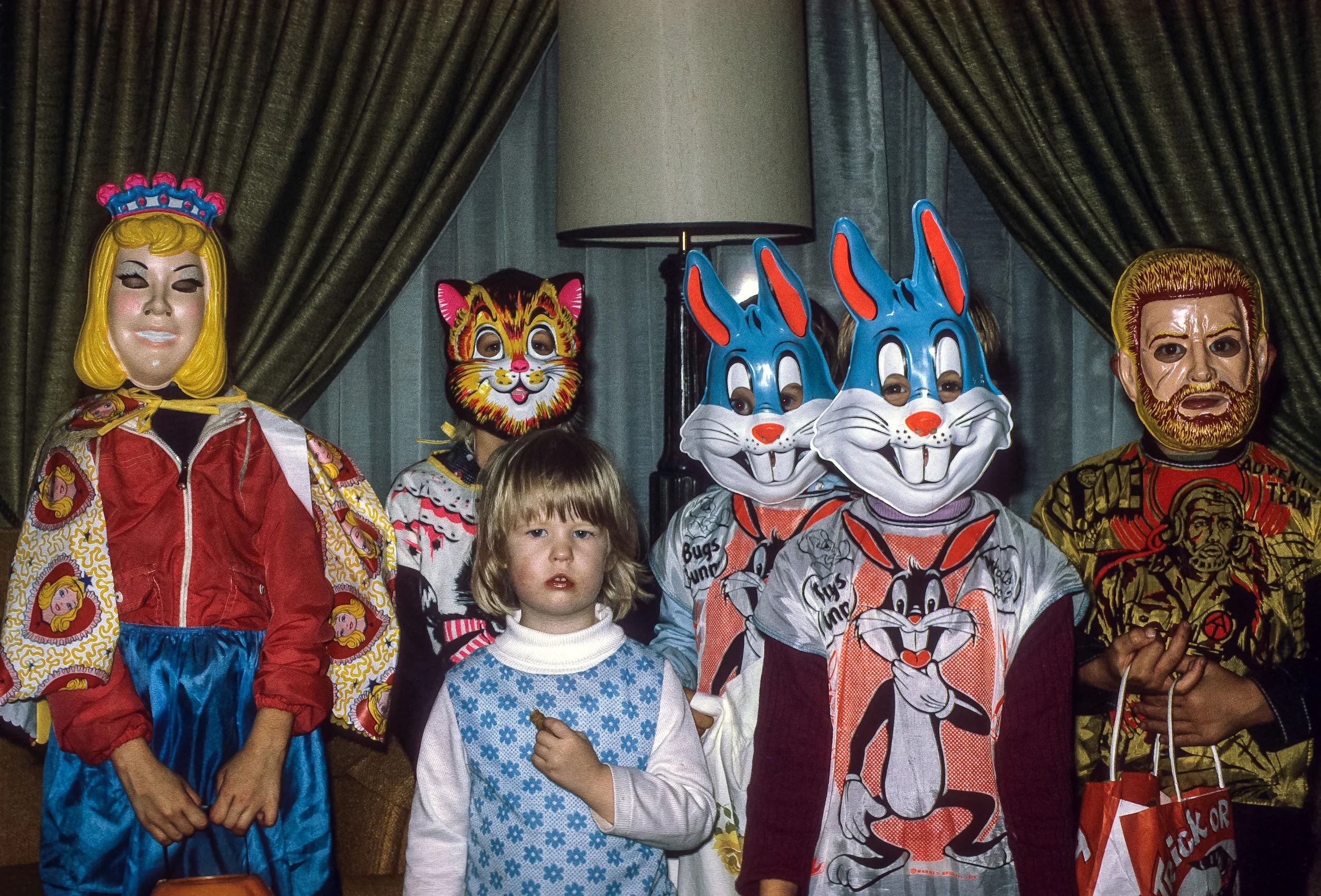 Image of 6 children. 5 are wearing a mask and one is not. Vintage photo.  People pleasing. Childhood trauma. Setting boundaries. Toxic relationships.