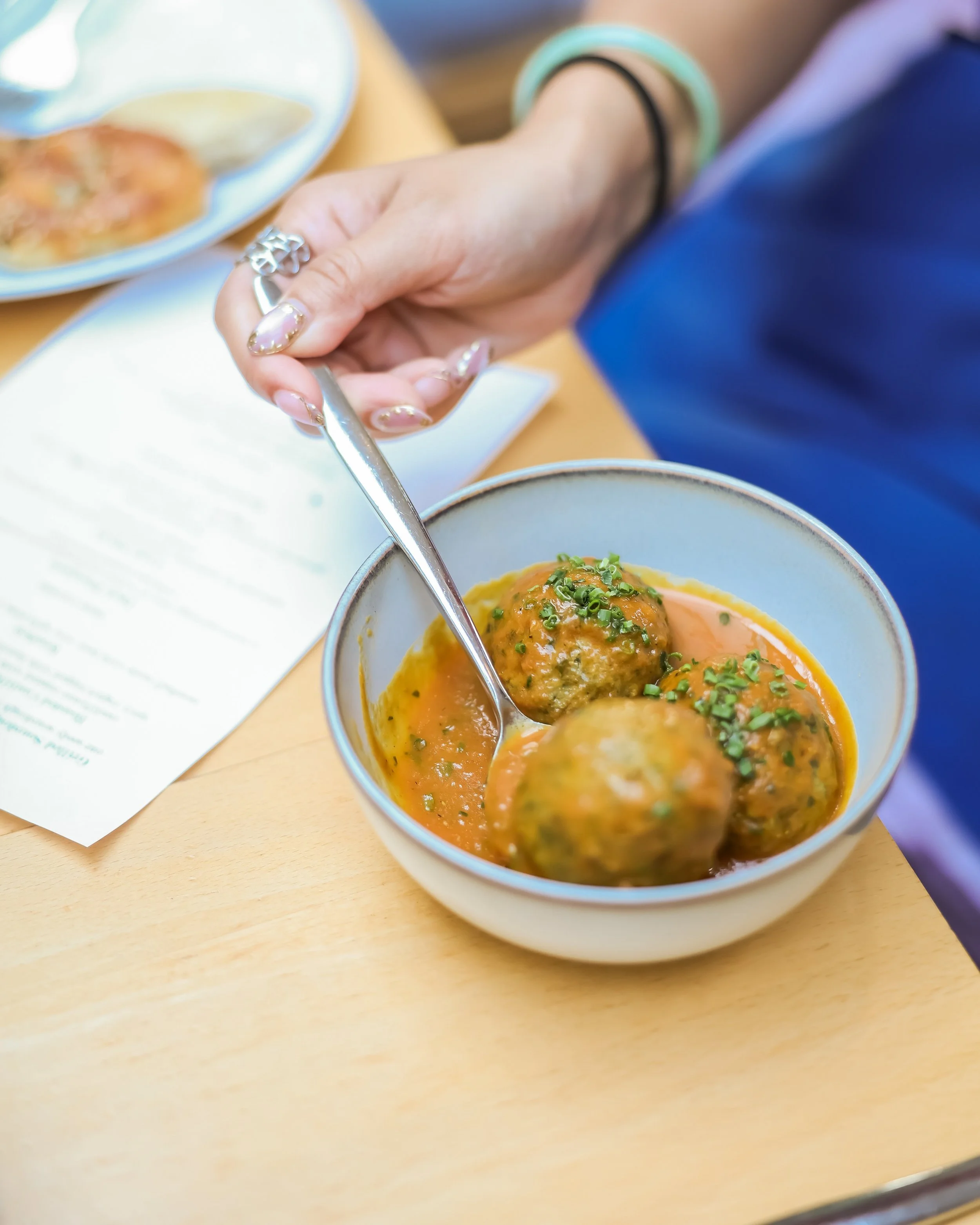 Fall Foodie Feature: What we're loving at @delararestaurant right now! 🧆

Koofteh - Three meatballs made with beef, rice, split peas, herbs, walnuts and plums, served with a slice of seedy sourdough flatbread

Roasted Cauliflower and Yogurt - Caulif