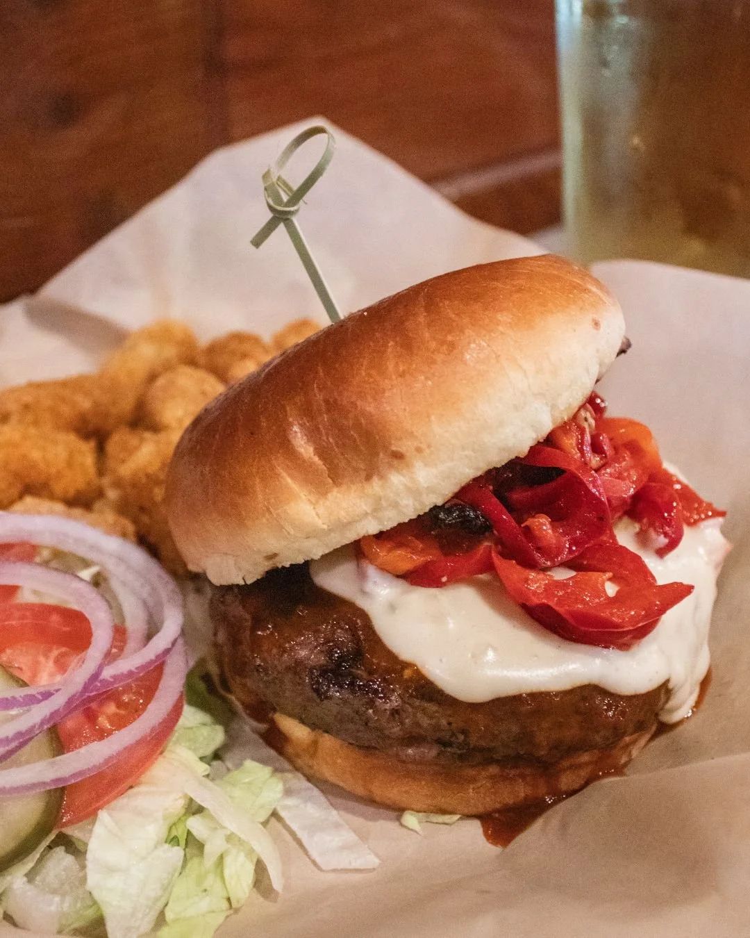 🔥 It&rsquo;s Burger Night! Every Wednesday from 4&ndash;close, get $2 off all burgers &mdash; including our fan favorite Brushfire Burger with beer cheese fondue, roasted peppers, and prairie fire sauce. 🍔🔥 #BurgerNight #CowboyFoodandDrink
