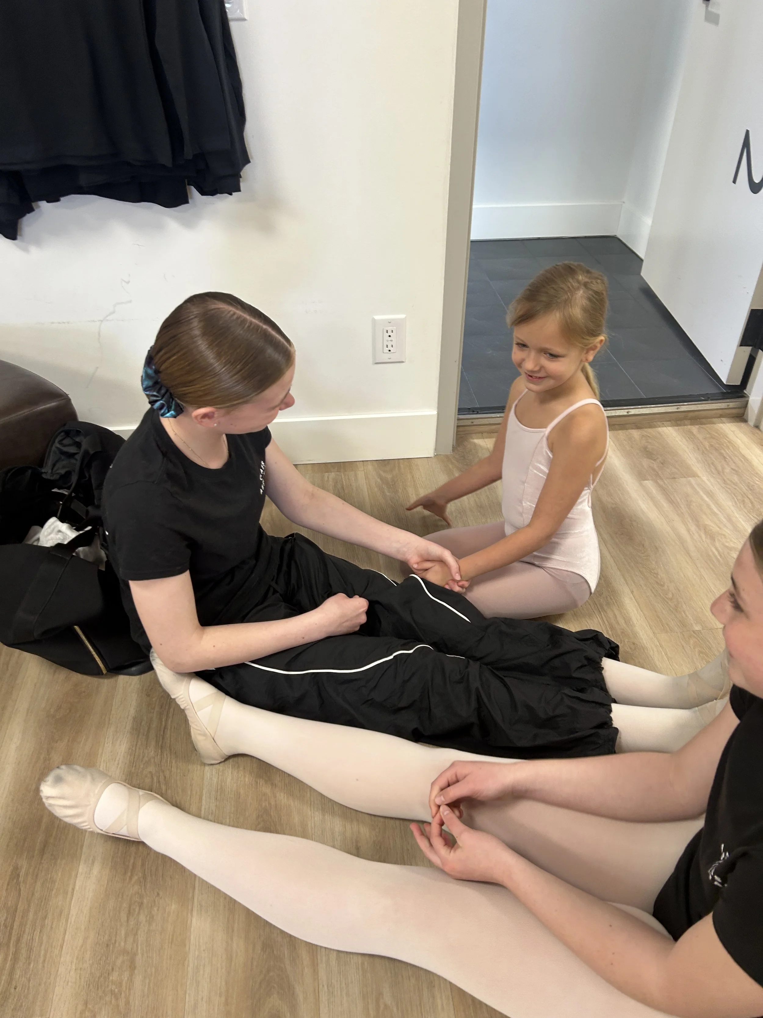 Bonds between older and younger students grow everywhere at KDF! We love our class assistants and the way they interact with our little ones.