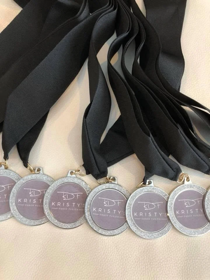 These beautiful medals are for when our dancers achieve 5 full years with our dance studio. What a treat to receive after all that hard work!