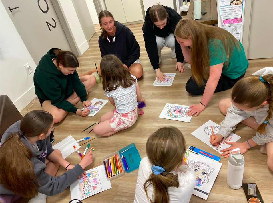 Our older students love interacting with our little dancers between classes! This one started a colouring party! 2025