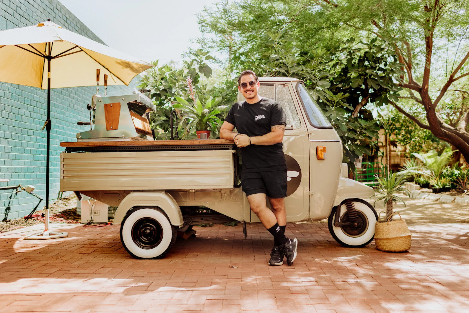 Fio, serving espresso from his Vespa