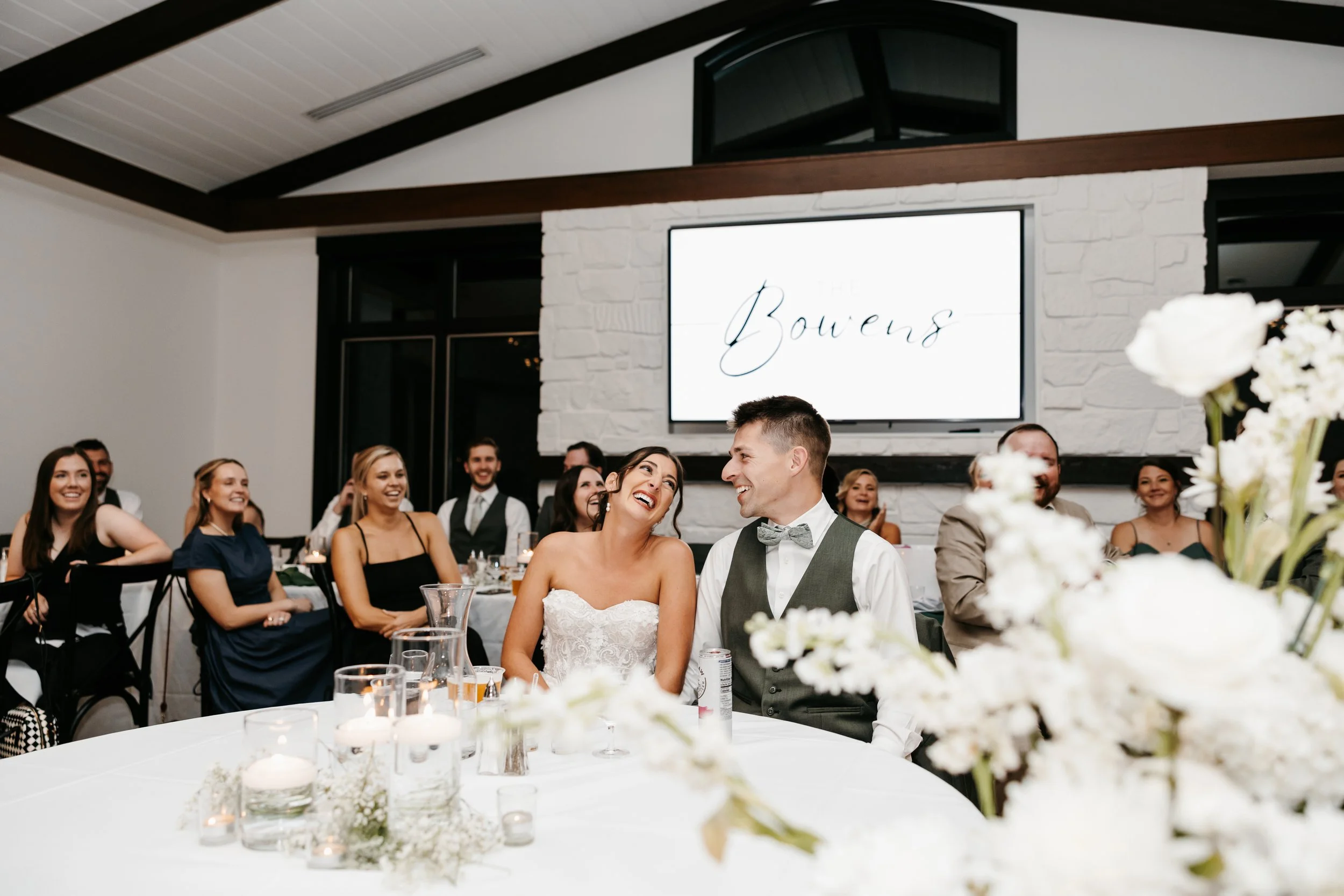 Newlyweds smile at Minneapolis wedding reception