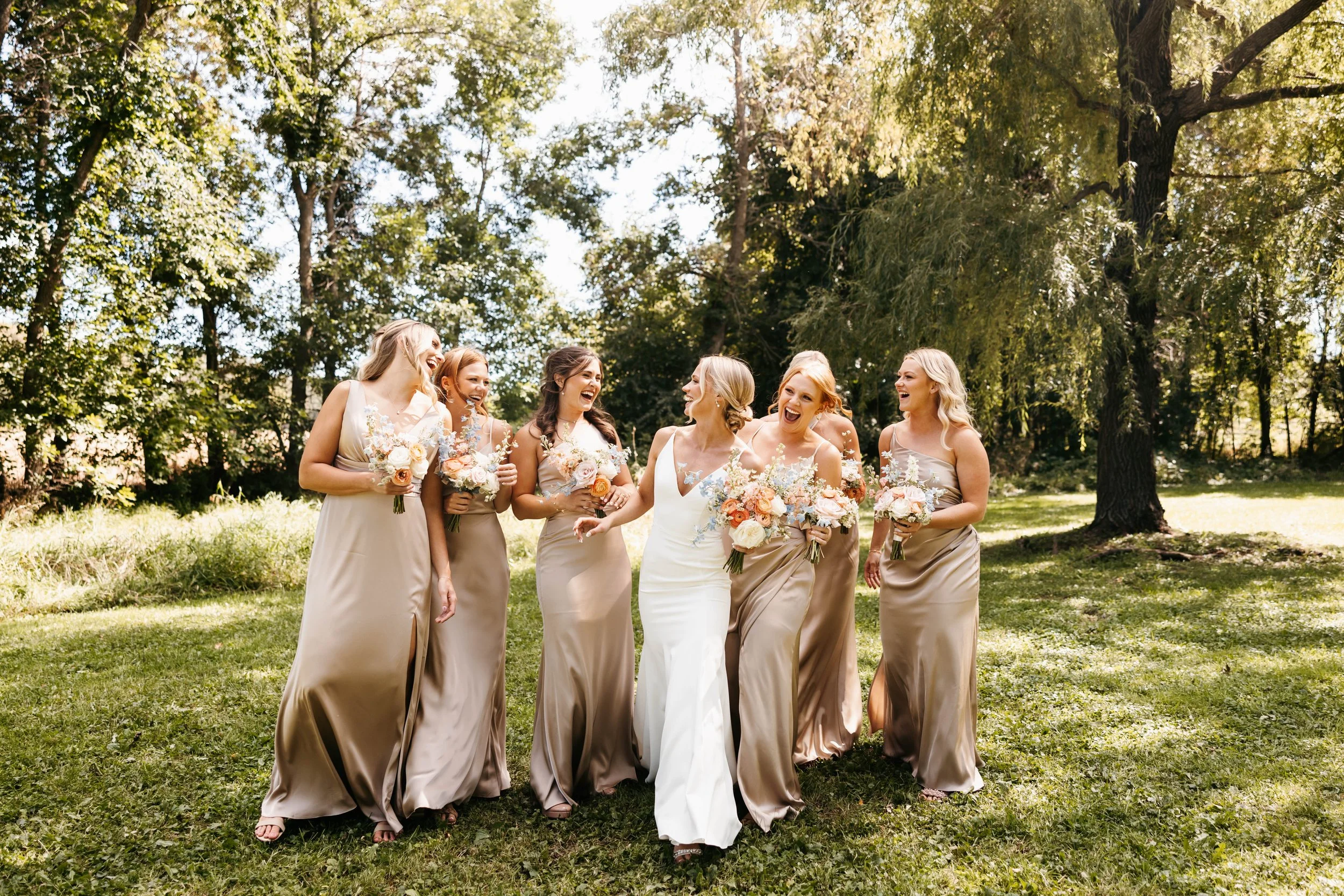 Minnesota wedding party pose for photographer