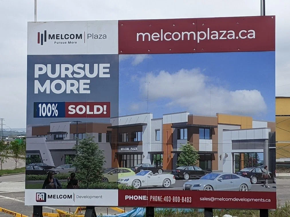 Large Commercial Skid Signs with Flags.jpg