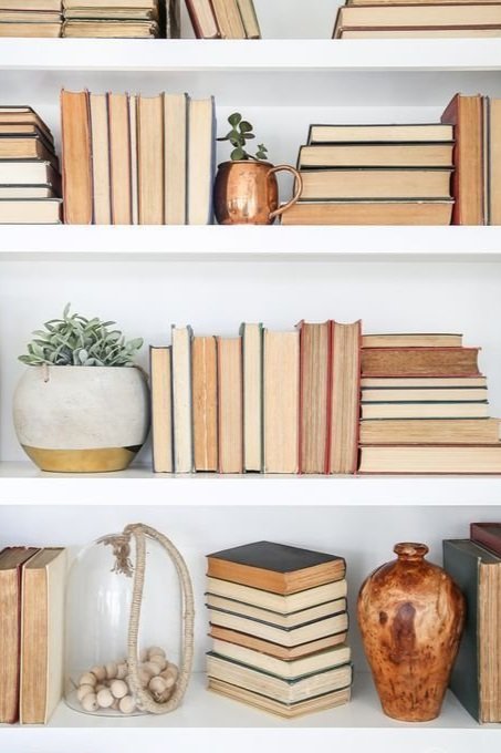 gatheraus+-+styling+a+bookshelf+-+backwards+books.jpg