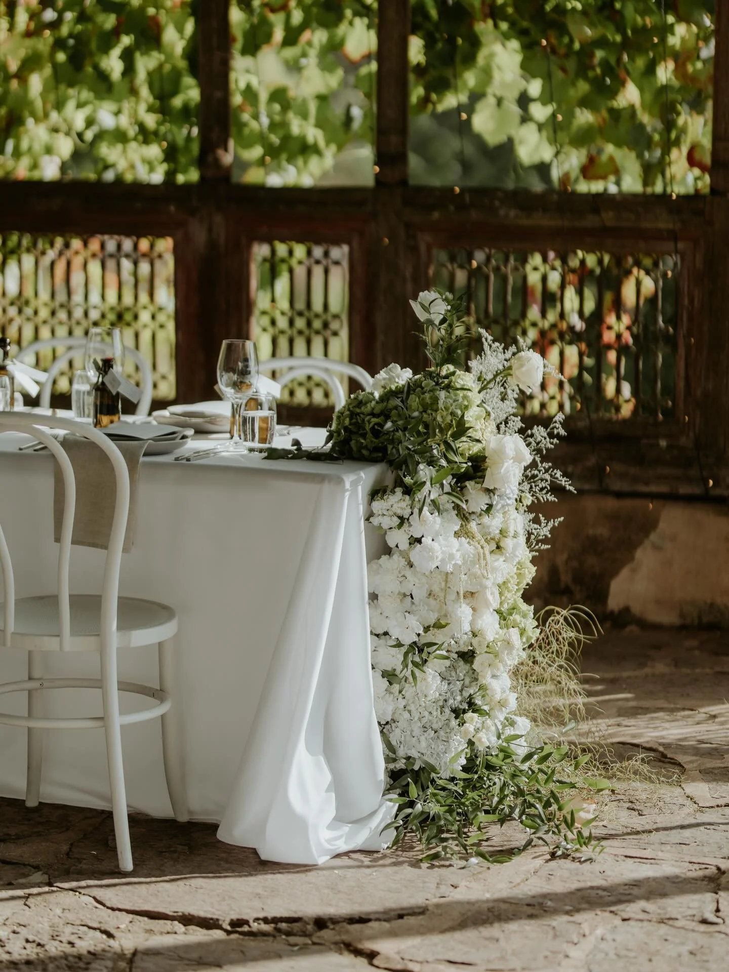 When the location is this stunning, the setup just melts right into the magic. #lisanardellaweddings