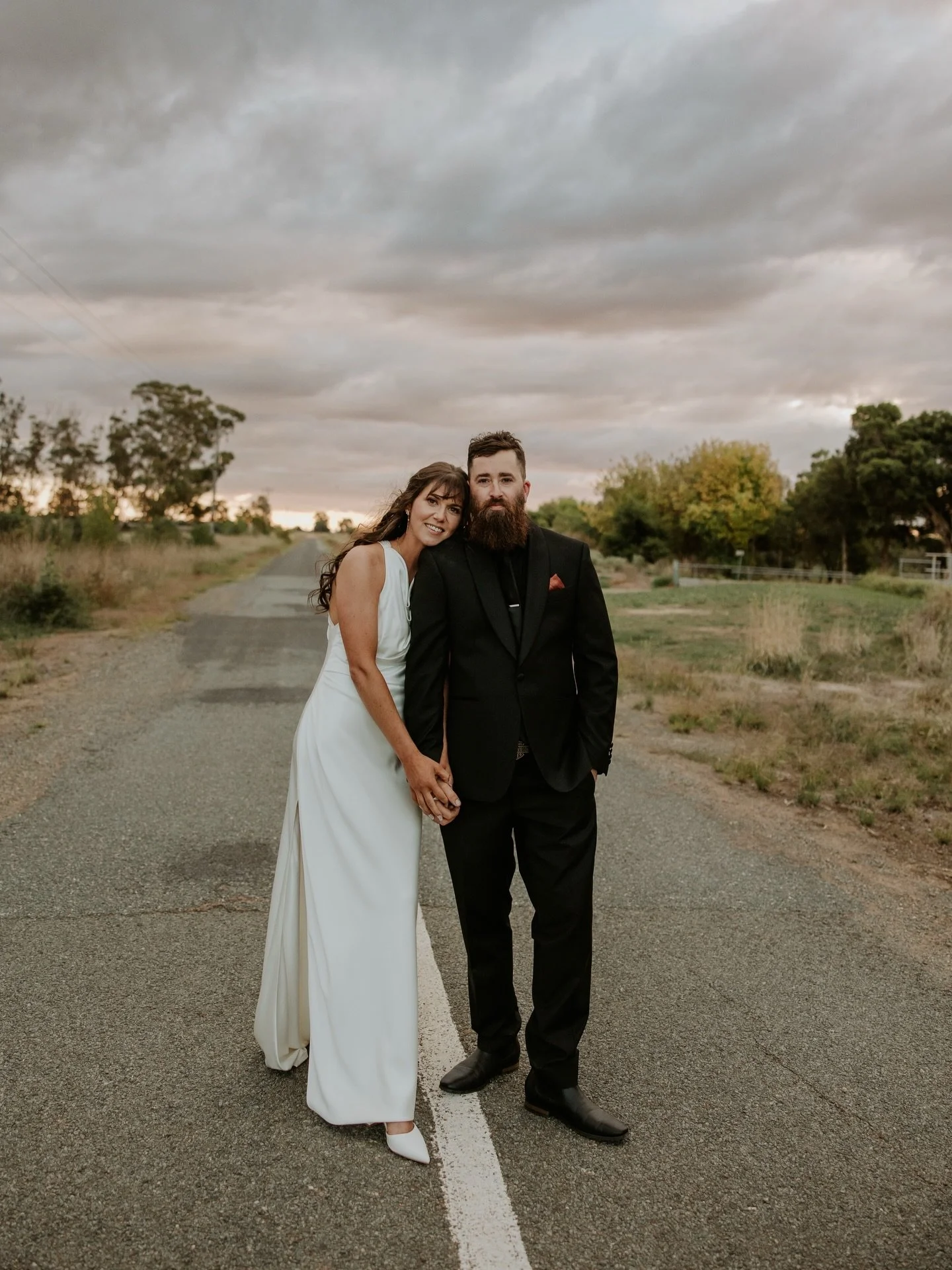 I finished off my wedding season with Rebecca and Mitch, and what a way to end it.
They were married on their own farm, saying their vows in the gardens they&rsquo;ve made their own. It felt so personal from the very beginning. After the ceremony, th
