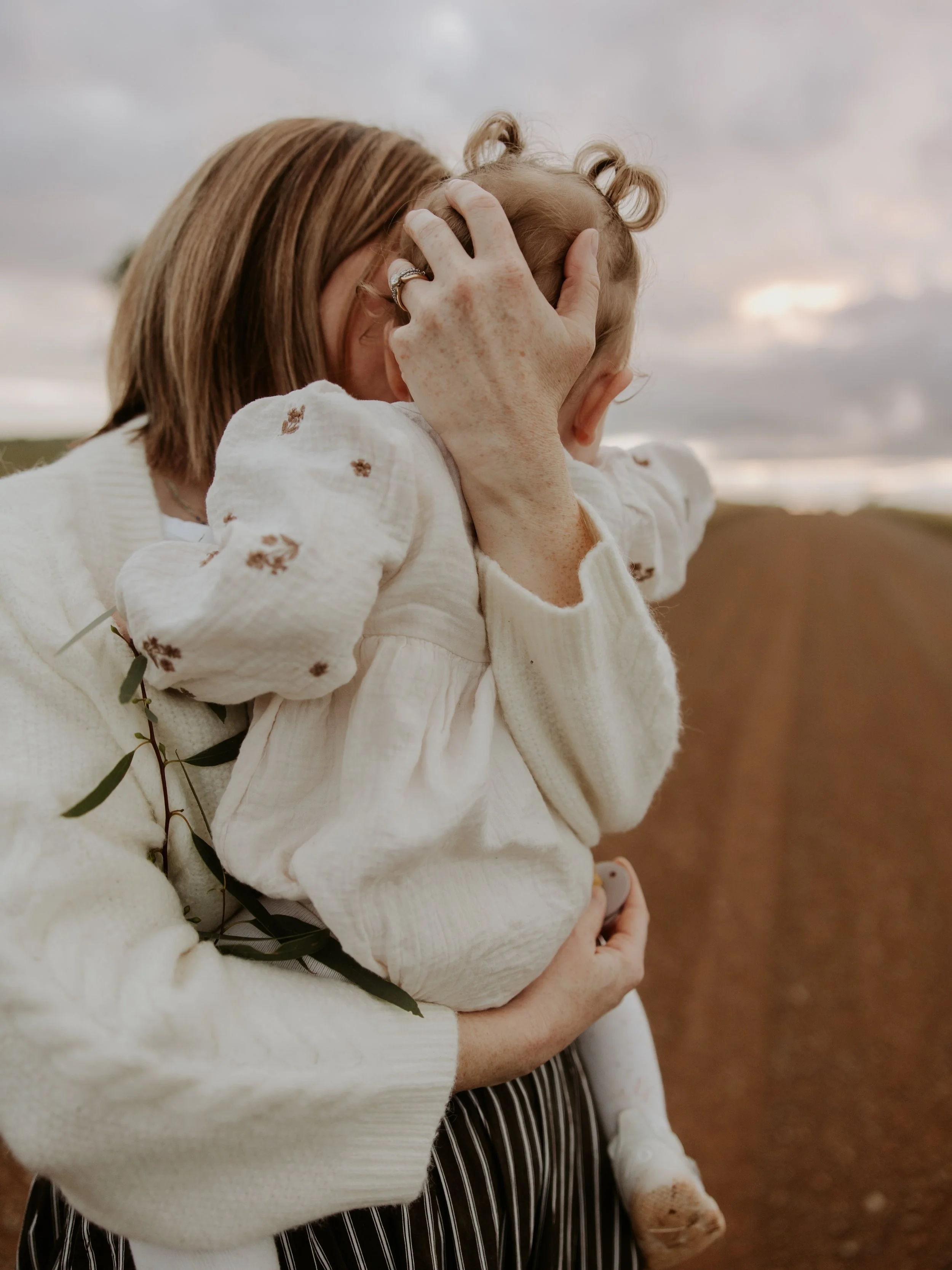 The best spot in the world? Right in Mumma's arms. 🩷