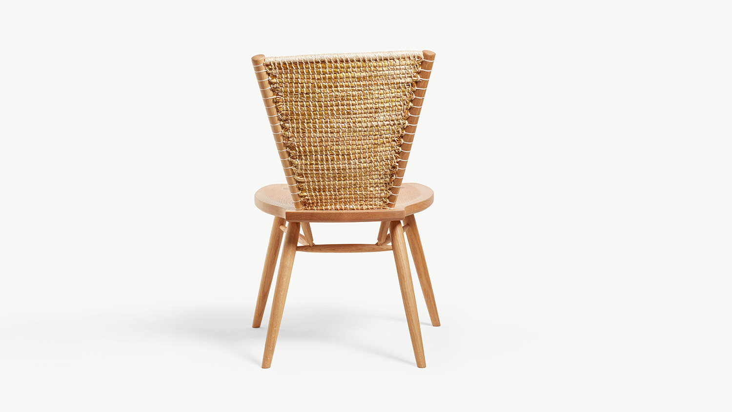 woven straw backed dining chair