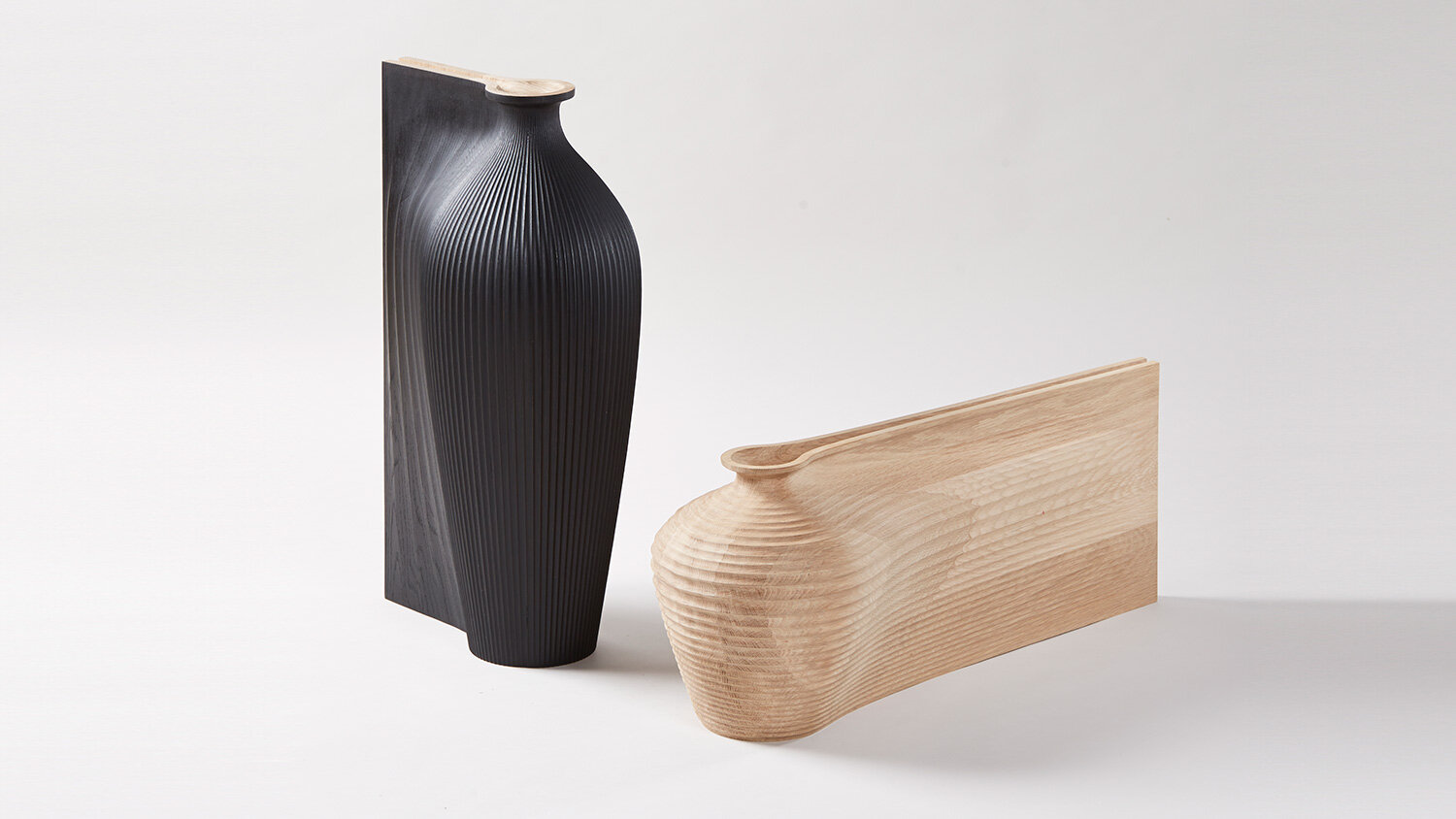 Two wooden computer printed objects