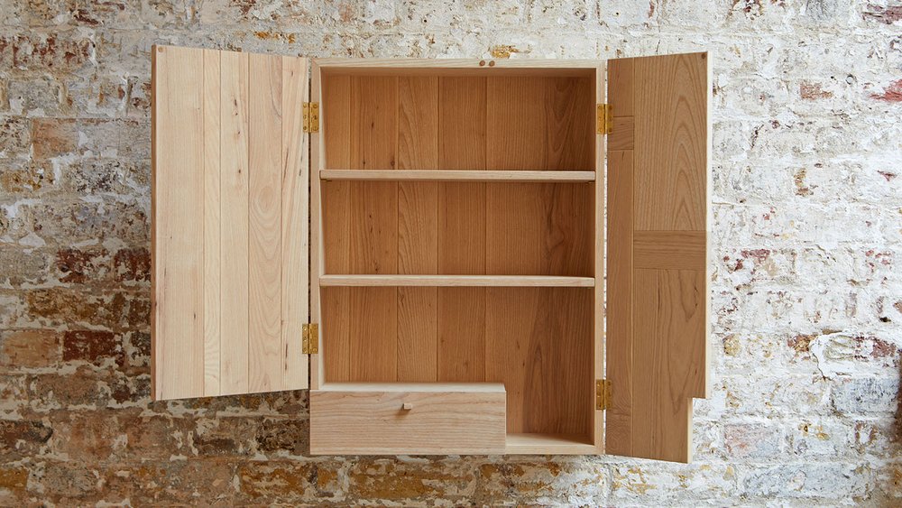 Wooden wall cabinet open.jpg