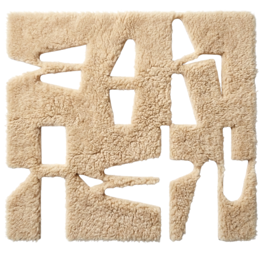 Text spelling out the word 'LOVE' in a fluffy, light beige, textured material.