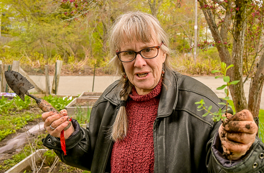 Iris Weaver with trowel and sprout.png