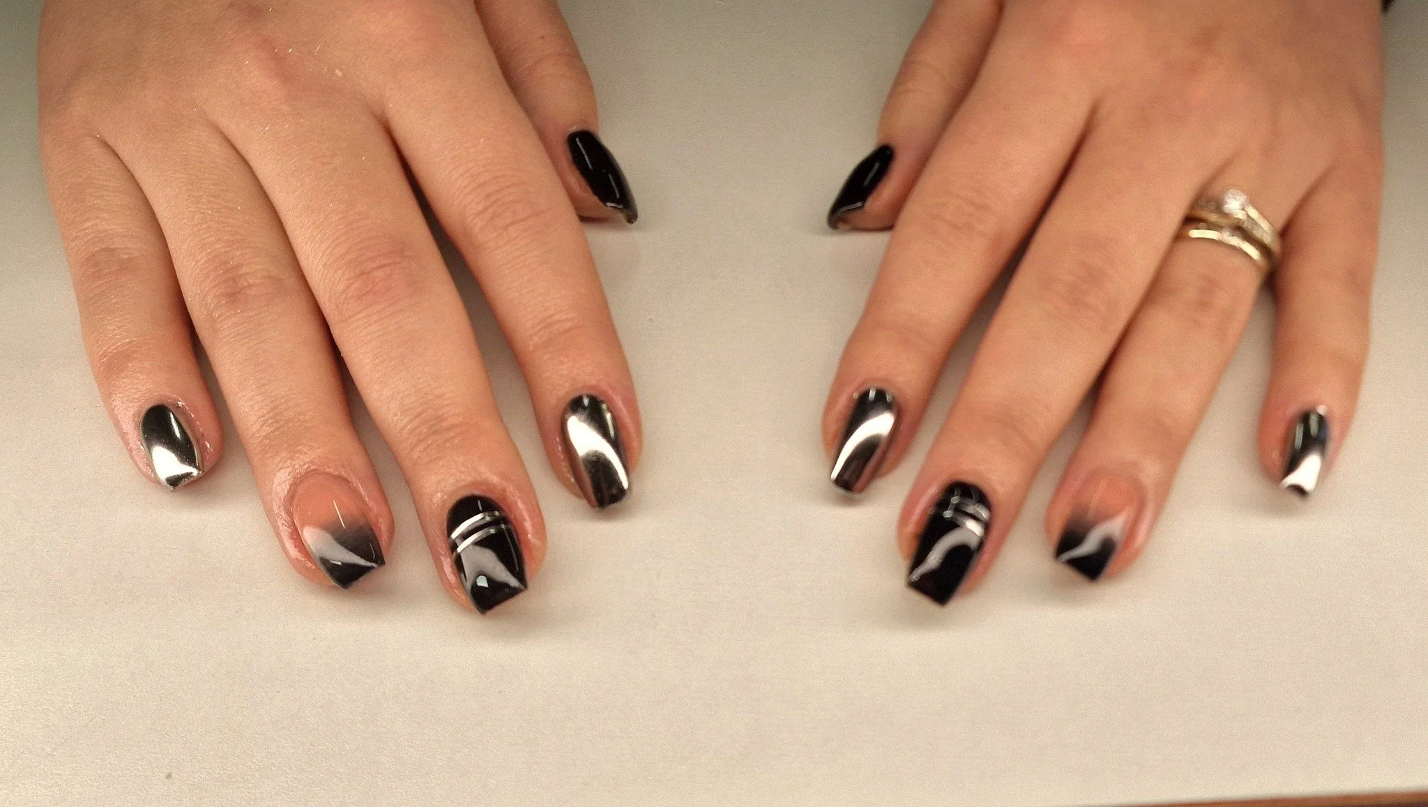 🖤🩶

💅 Service: Gel Tip Extensions with Intermediate Nail Art 
🕑 Time: 90 mins
💷 Cost: &pound;46

Check Availability &amp; Book Online at www.strawberrybronze.co.uk 🍓

🧴Products: 
@the_gelbottle_inc 
@labology3 
@glitterplanetuk 
@thecuticlelab