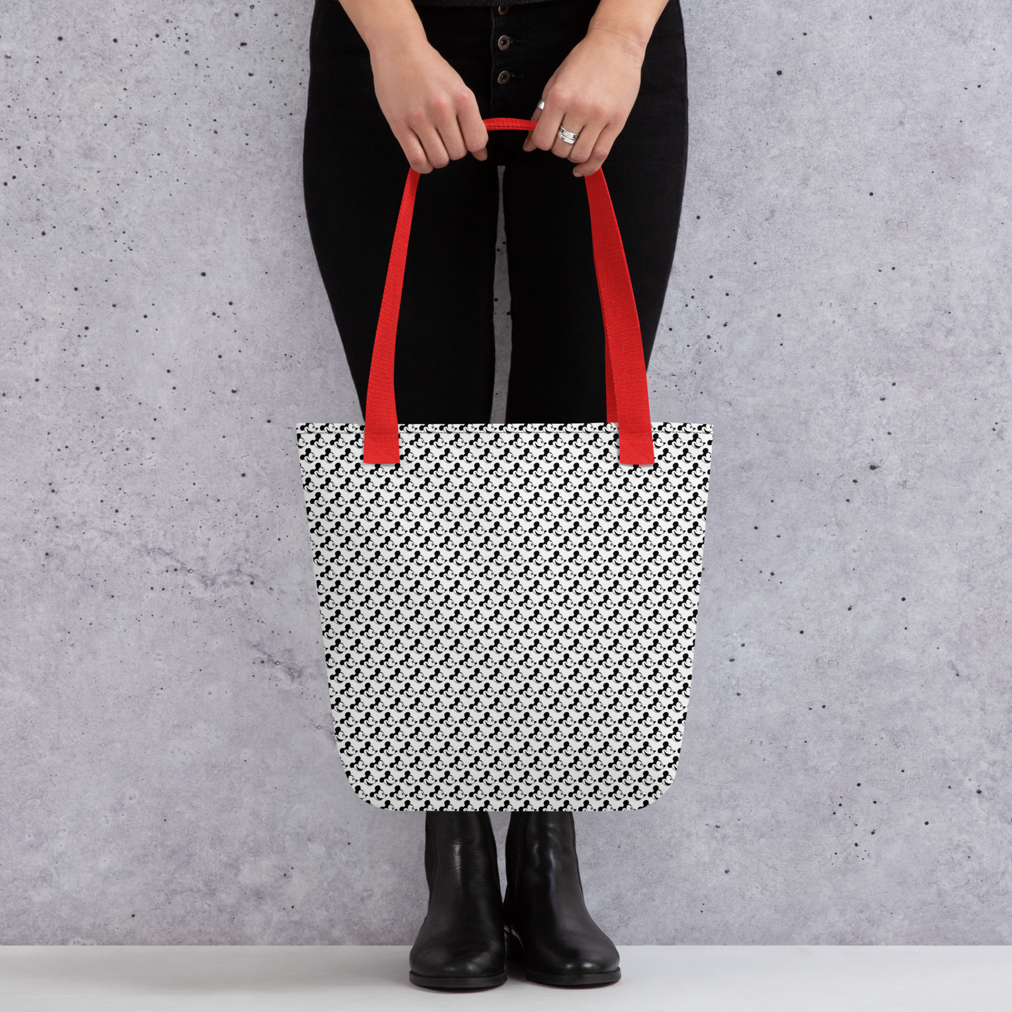 Steamboat Willie Micke Mouse Black White Red Vintage Tote Bag held by a white woman in black pants